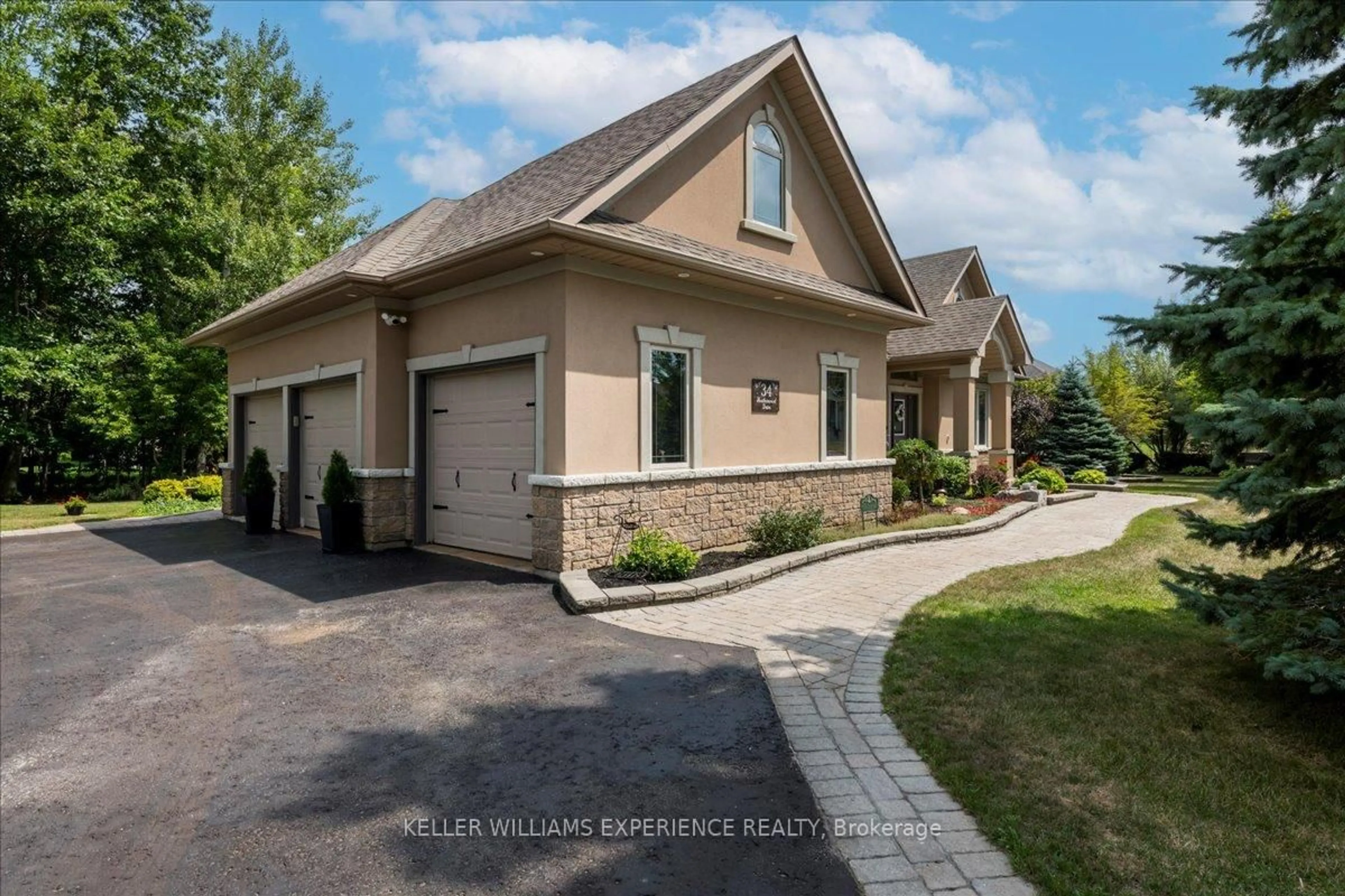 Home with brick exterior material, street for 34 Heatherwood Dr, Springwater Ontario L0L 1X1