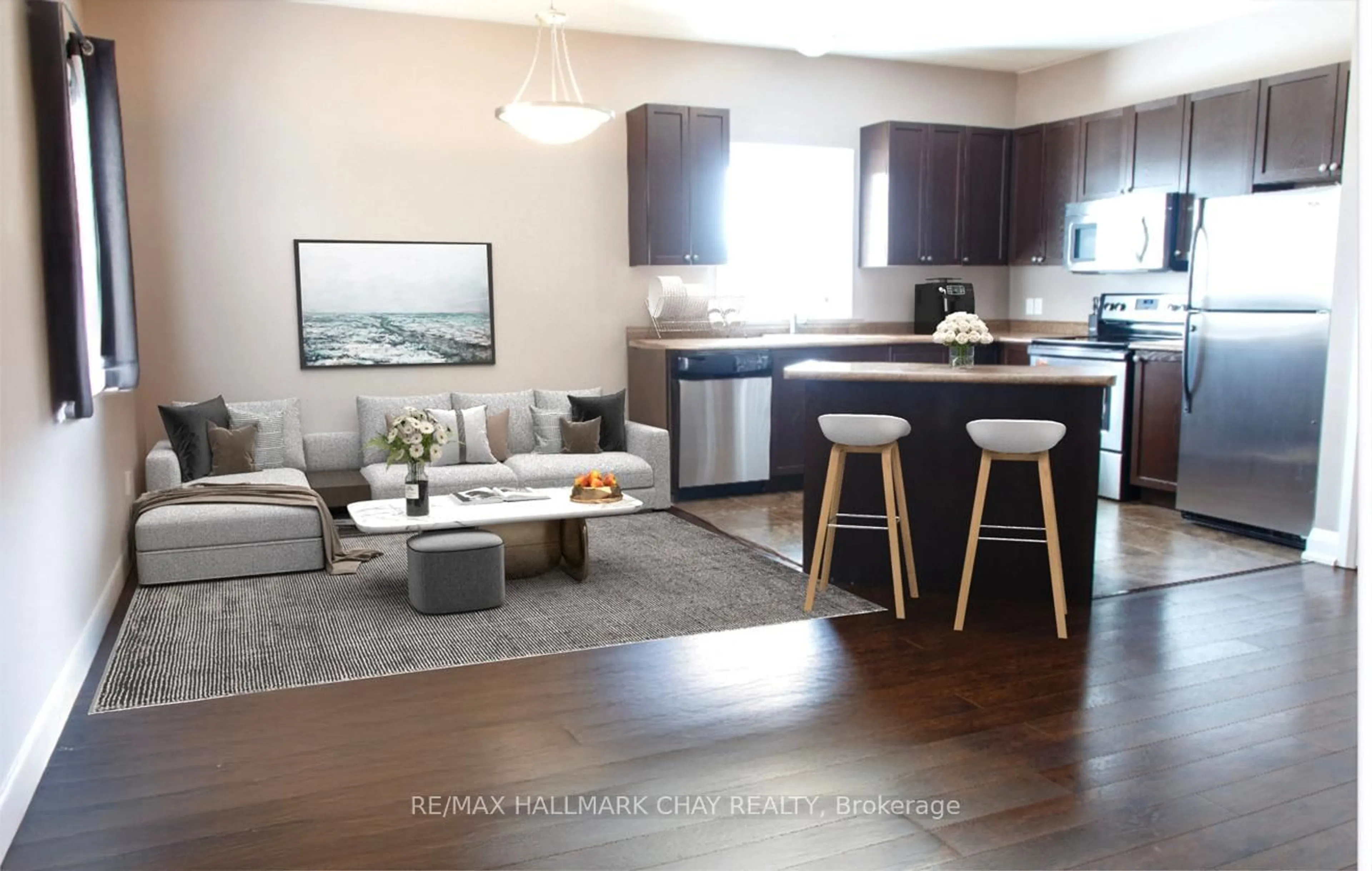 Open concept kitchen, wood/laminate floor for 3939 Wood Ave, Severn Ontario L3V 0T9