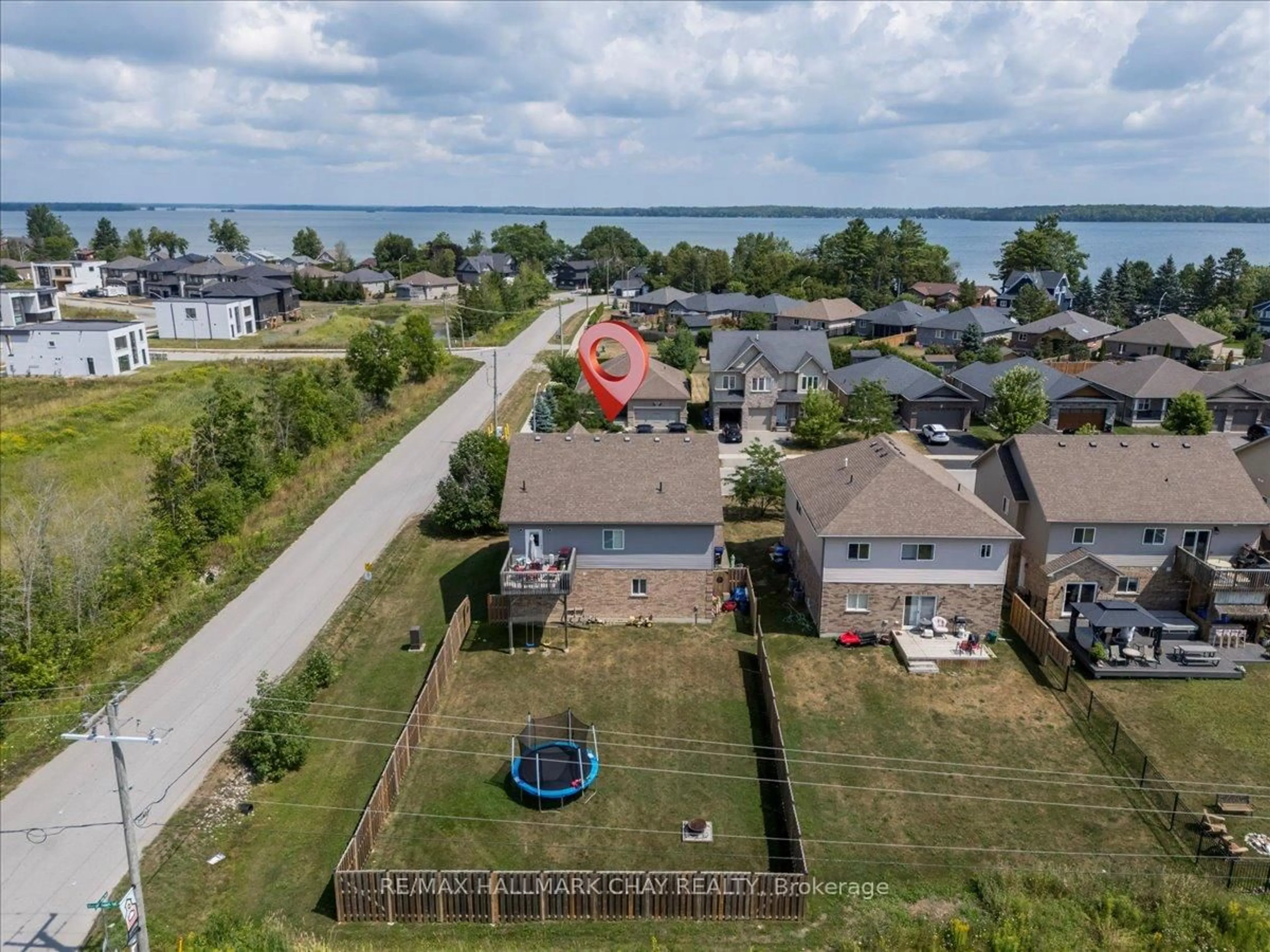 A pic from outside/outdoor area/front of a property/back of a property/a pic from drone, water/lake/river/ocean view for 3939 Wood Ave, Severn Ontario L3V 0T9