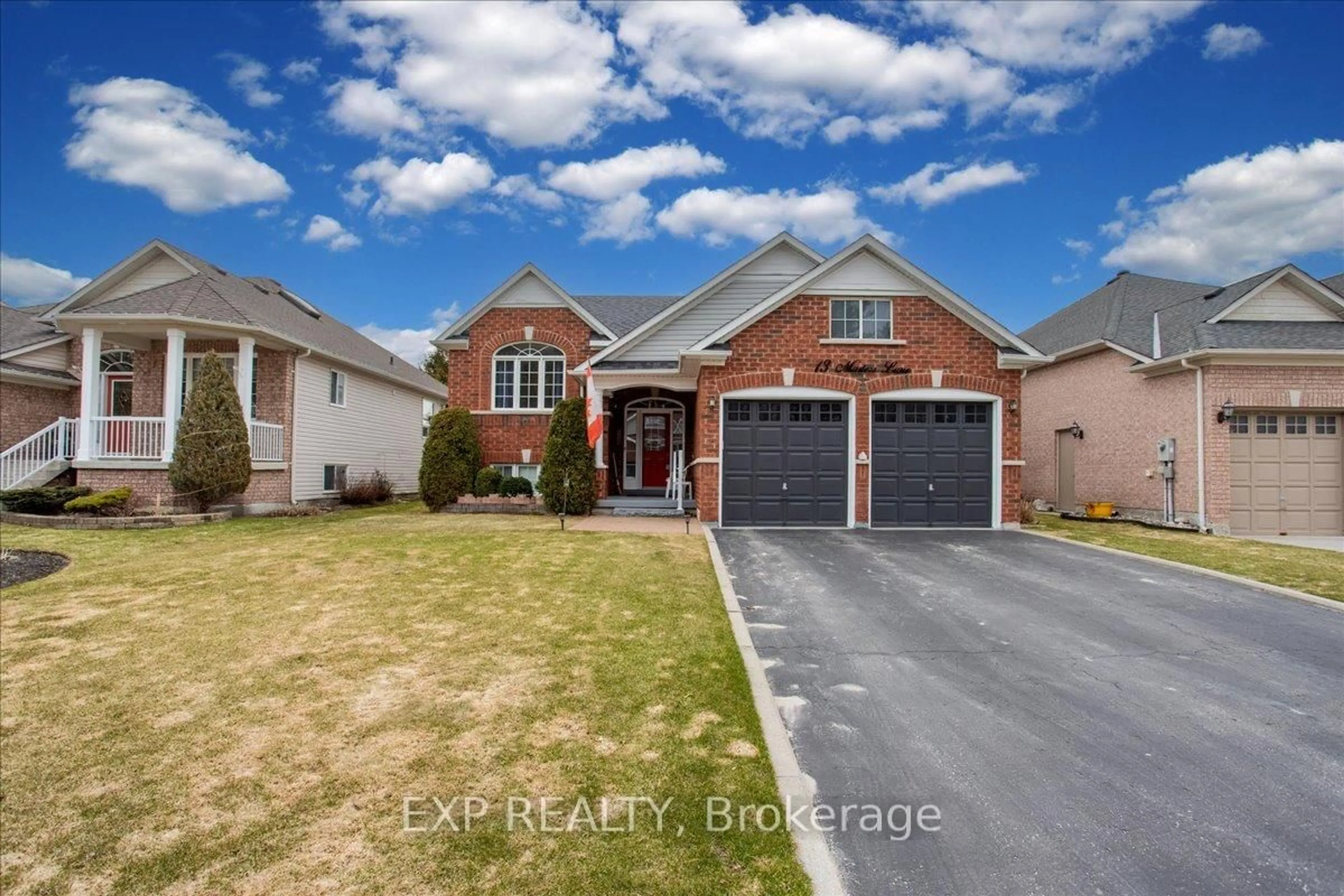 Home with brick exterior material, street for 13 Masters Lane, Wasaga Beach Ontario L9Z 1S9