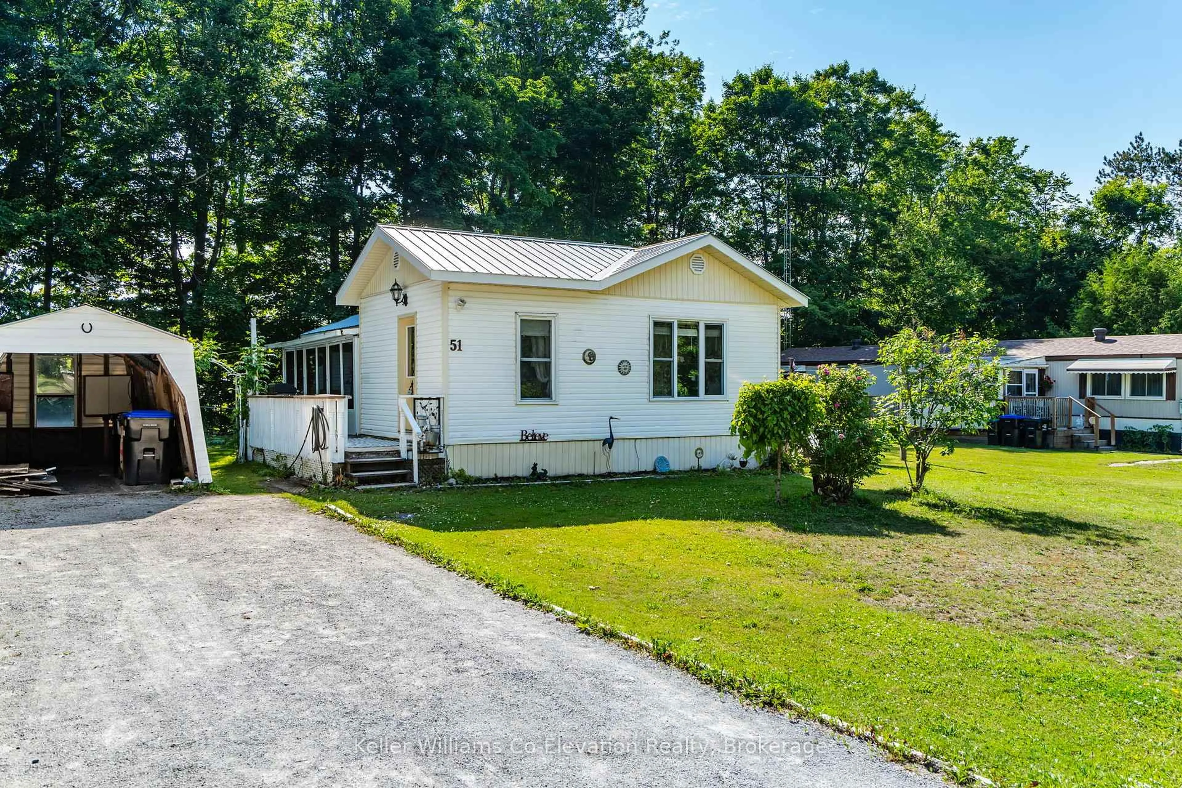 A pic from outside/outdoor area/front of a property/back of a property/a pic from drone, street for 5263 Elliott Sdrd #51, Tay Ontario L4R 4K3