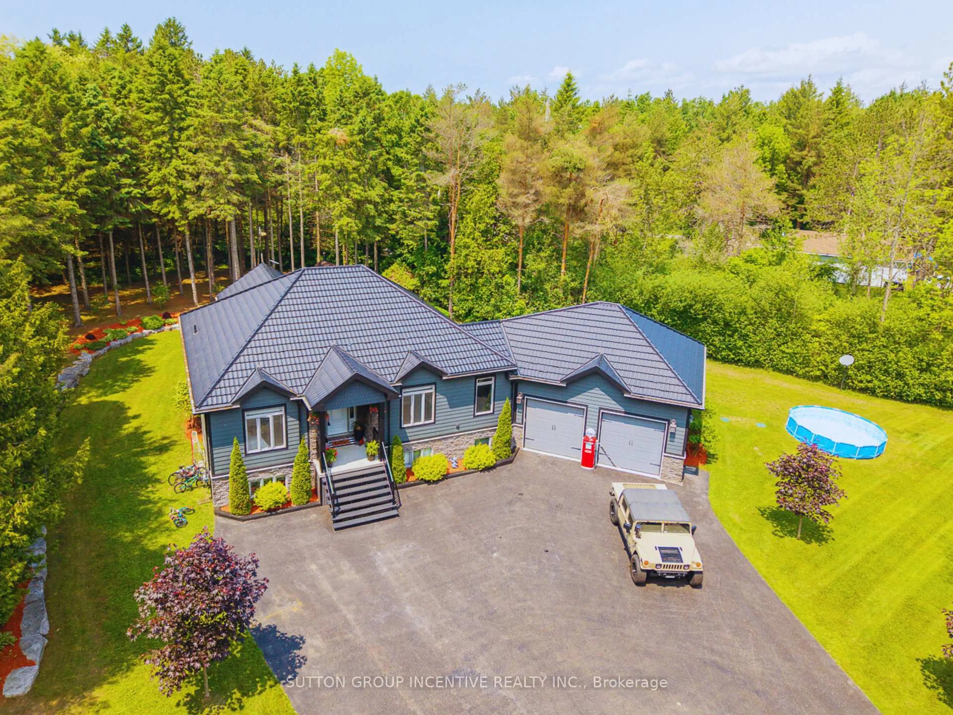 A pic from outside/outdoor area/front of a property/back of a property/a pic from drone, unknown for 7070 93 Highway, Tiny Ontario L0K 2E0