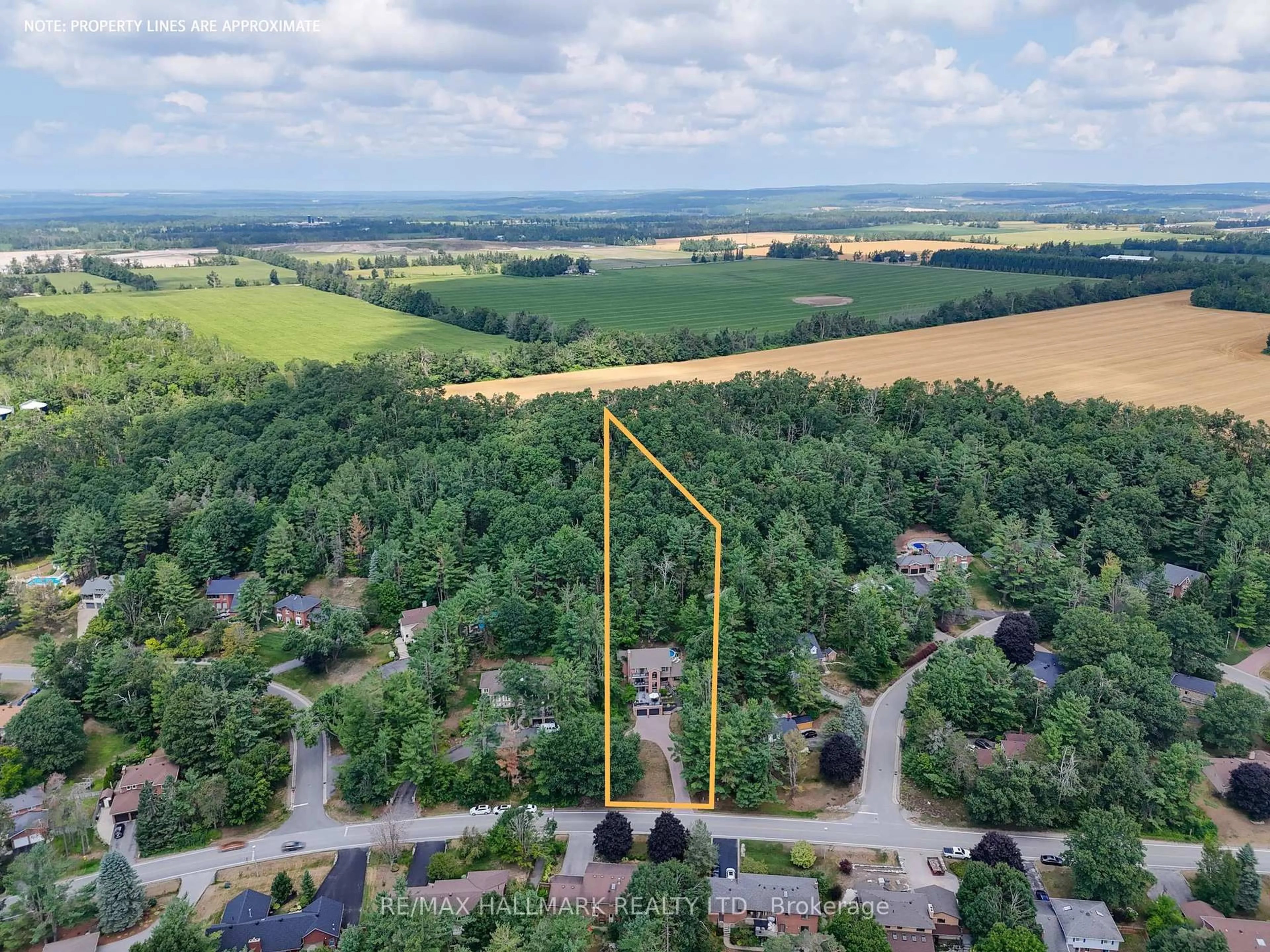 A pic from outside/outdoor area/front of a property/back of a property/a pic from drone, forest/trees view for 30 Pooles Rd, Springwater Ontario L0L 1X1