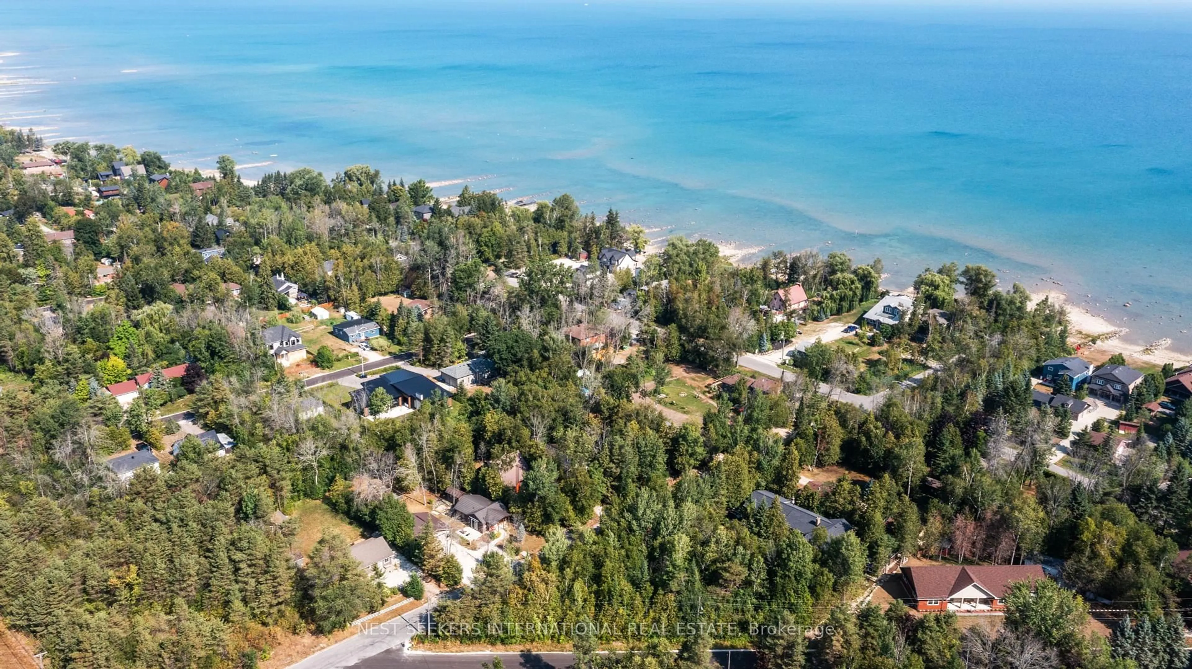 A pic from outside/outdoor area/front of a property/back of a property/a pic from drone, water/lake/river/ocean view for 15 Edgar Rd, Collingwood Ontario L9Y 3Z1