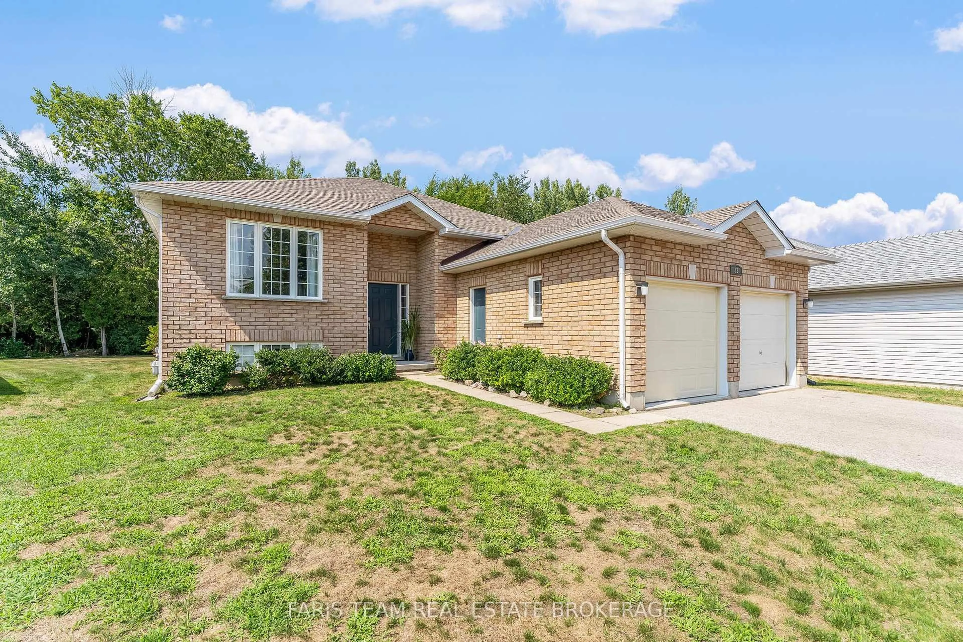 Home with brick exterior material, street for 83 Georgias Walk, Tay Ontario L0K 2A0