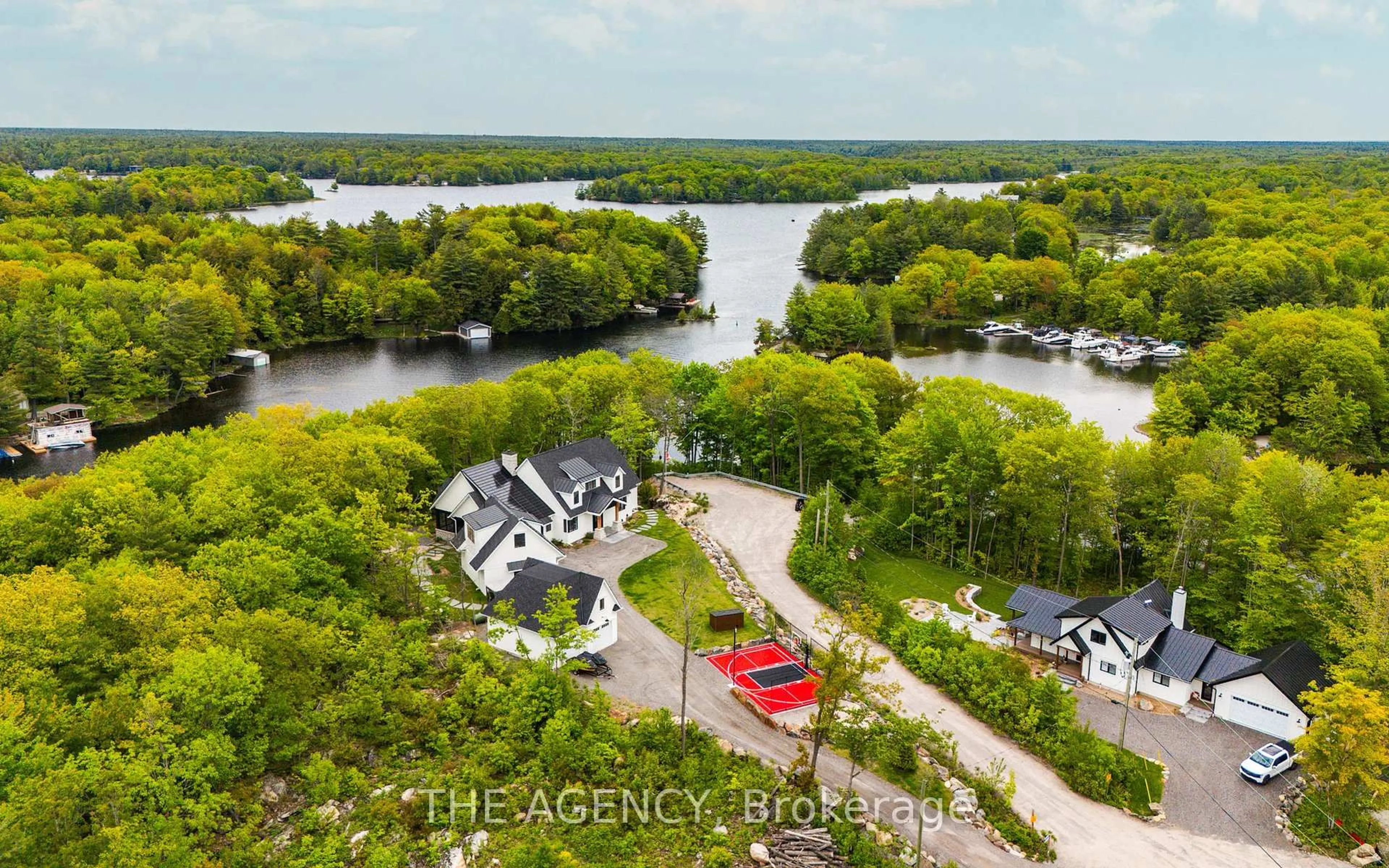 A pic from outside/outdoor area/front of a property/back of a property/a pic from drone, water/lake/river/ocean view for 3524 Isla Way, Severn Ontario L0K 1S0