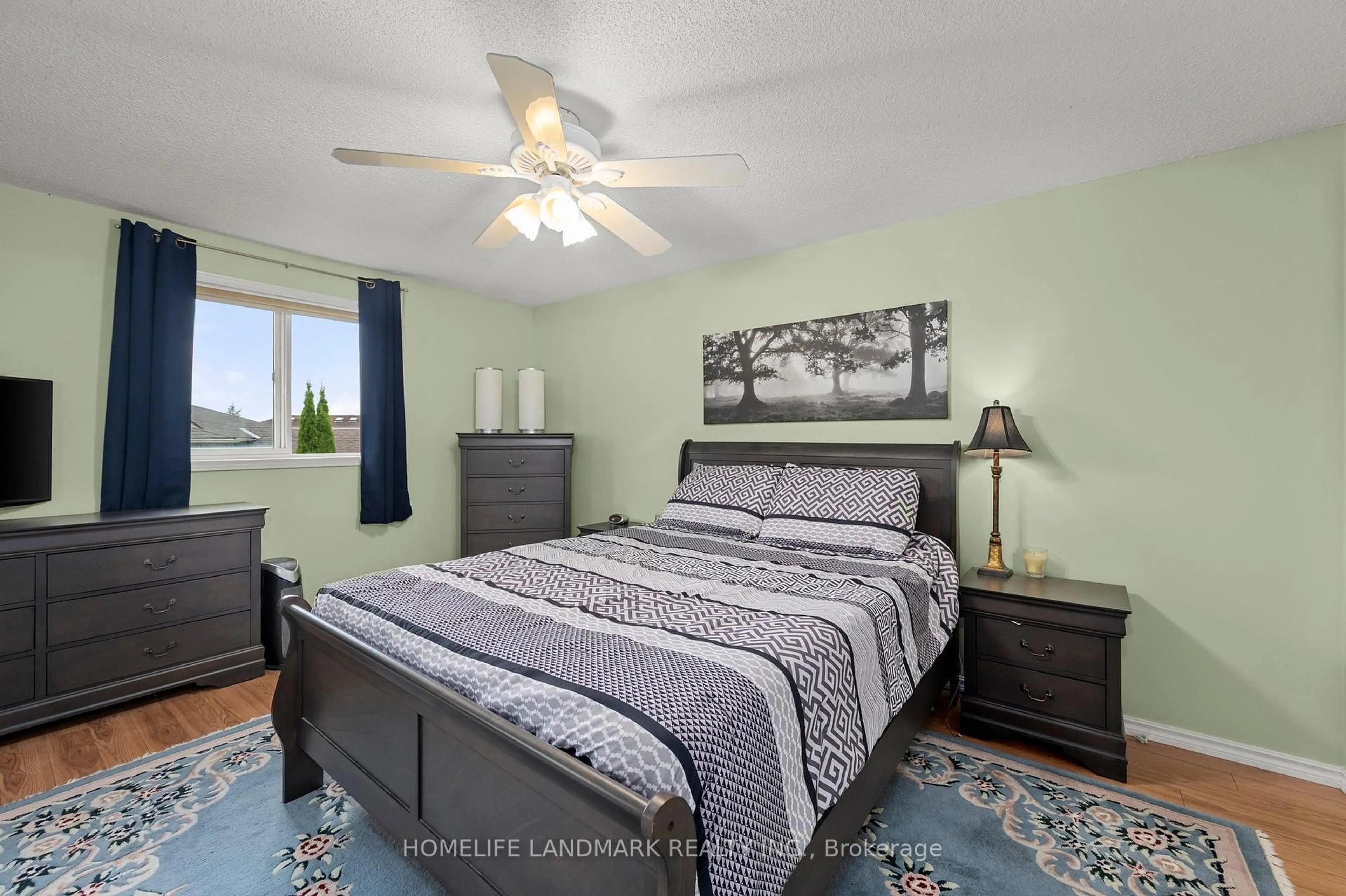Bedroom with bed, wood/laminate floor for 196 Columbia Rd, Barrie Ontario L4N 8C9