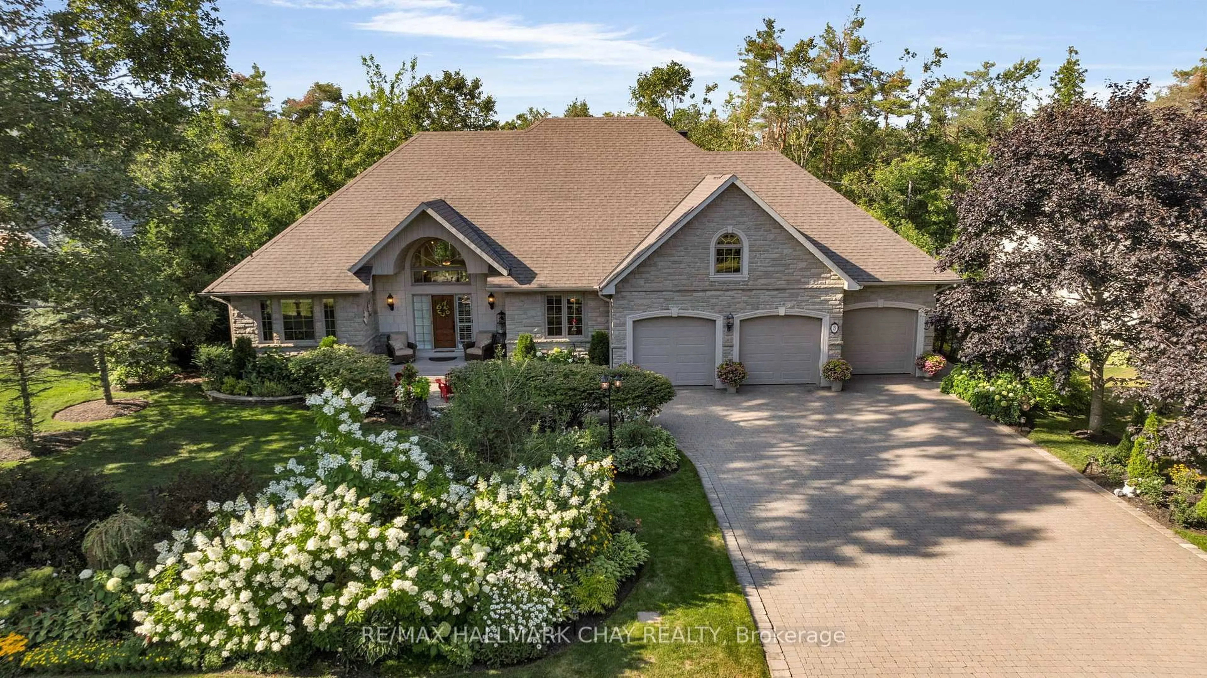 A pic from outside/outdoor area/front of a property/back of a property/a pic from drone, street for 8 Chestnut Lane, Oro-Medonte Ontario L0L 2L0