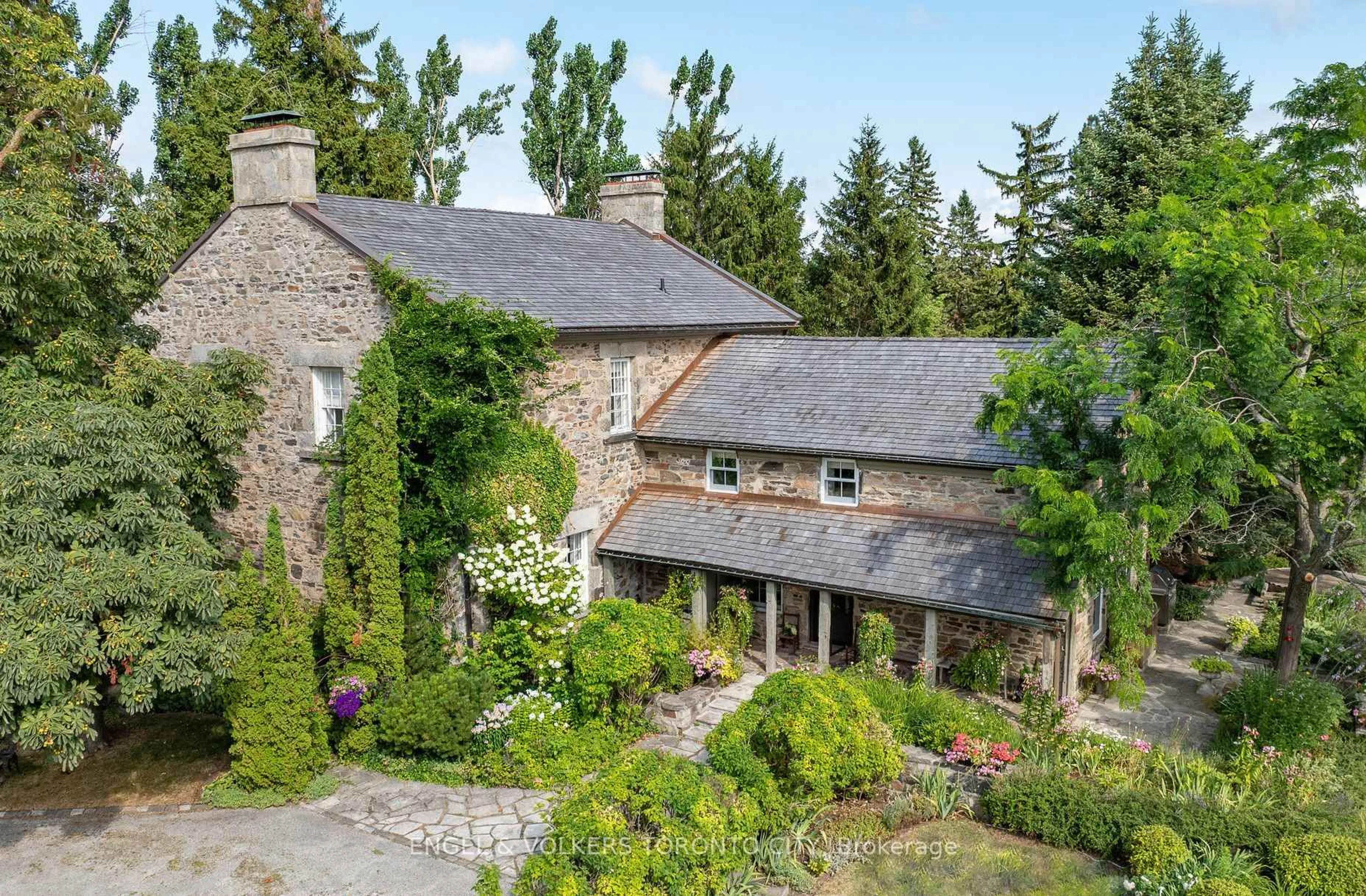 A pic from outside/outdoor area/front of a property/back of a property/a pic from drone, street for 2353 HWY 124, Clearview Ontario L0M 1H0