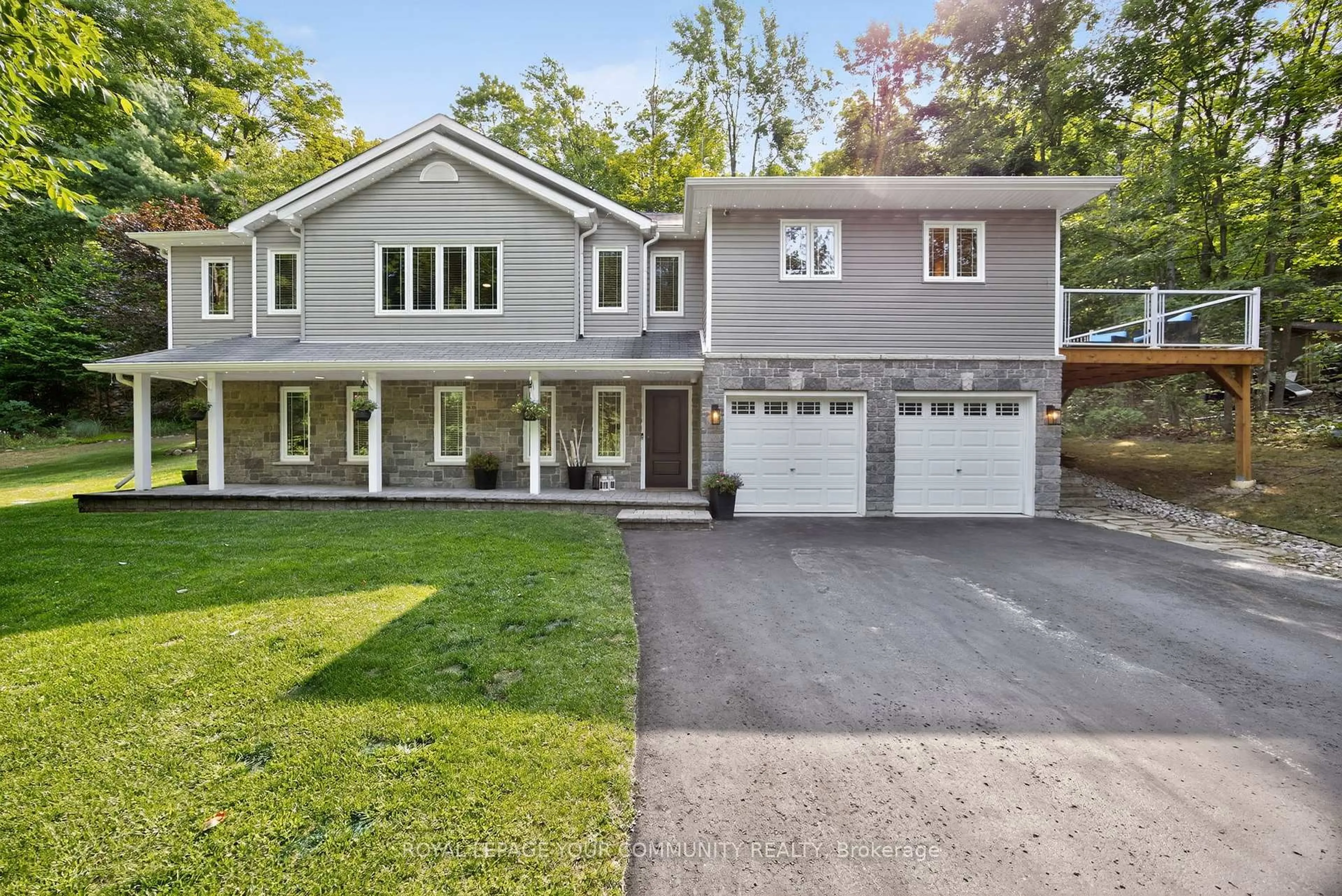 Home with vinyl exterior material, street for 135 Huronwoods Dr, Oro-Medonte Ontario L0K 1E0