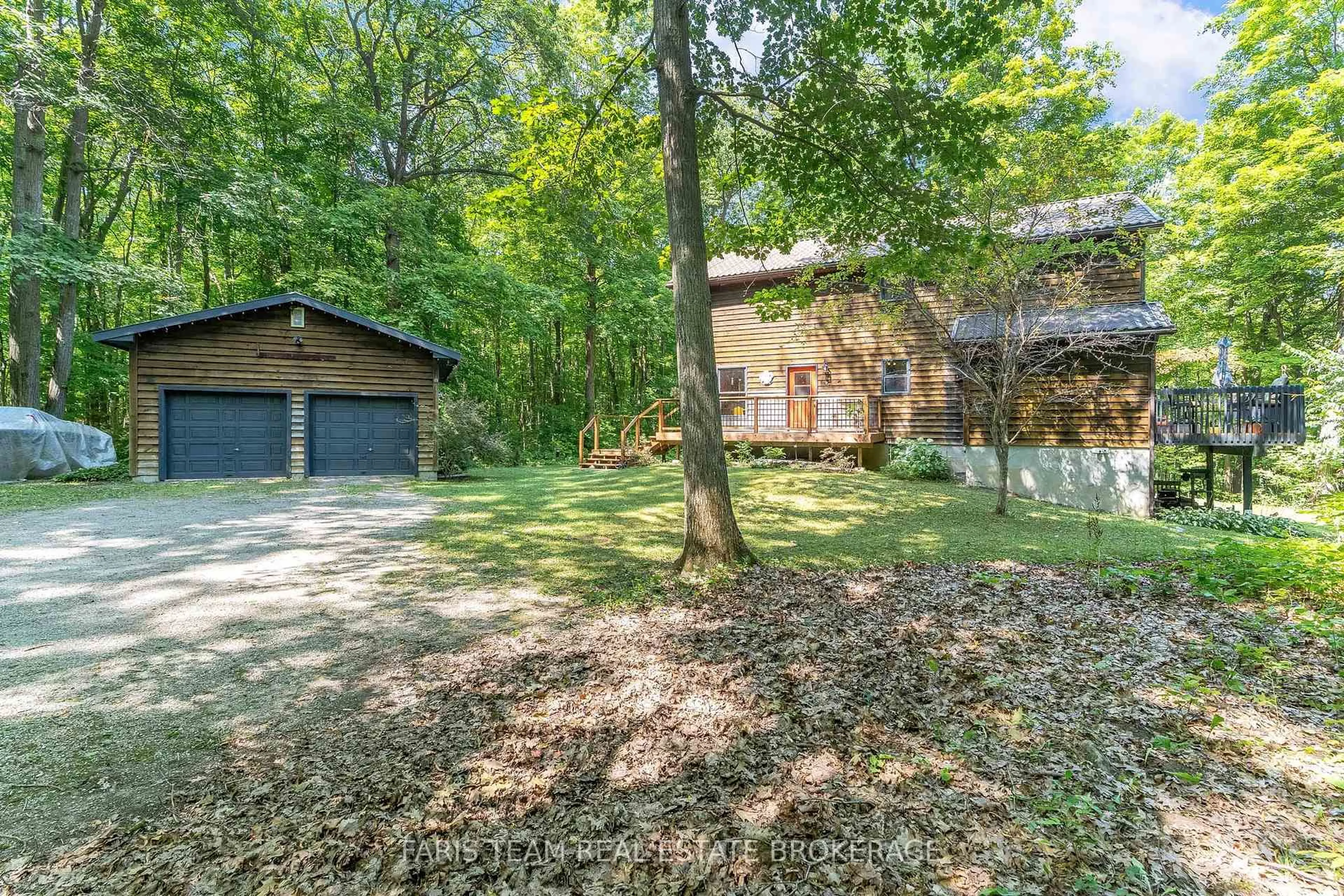 A pic from outside/outdoor area/front of a property/back of a property/a pic from drone, forest/trees view for 4094 Granny White Sdrd, Tay Ontario L0K 2A0