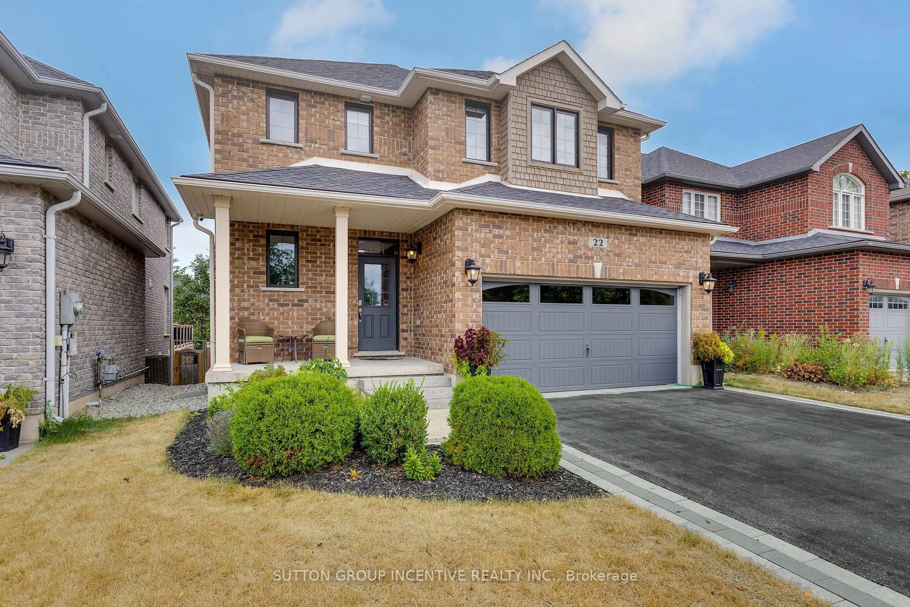 Home with brick exterior material, street for 22 Britannic Lane, Barrie Ontario L4N 8J7