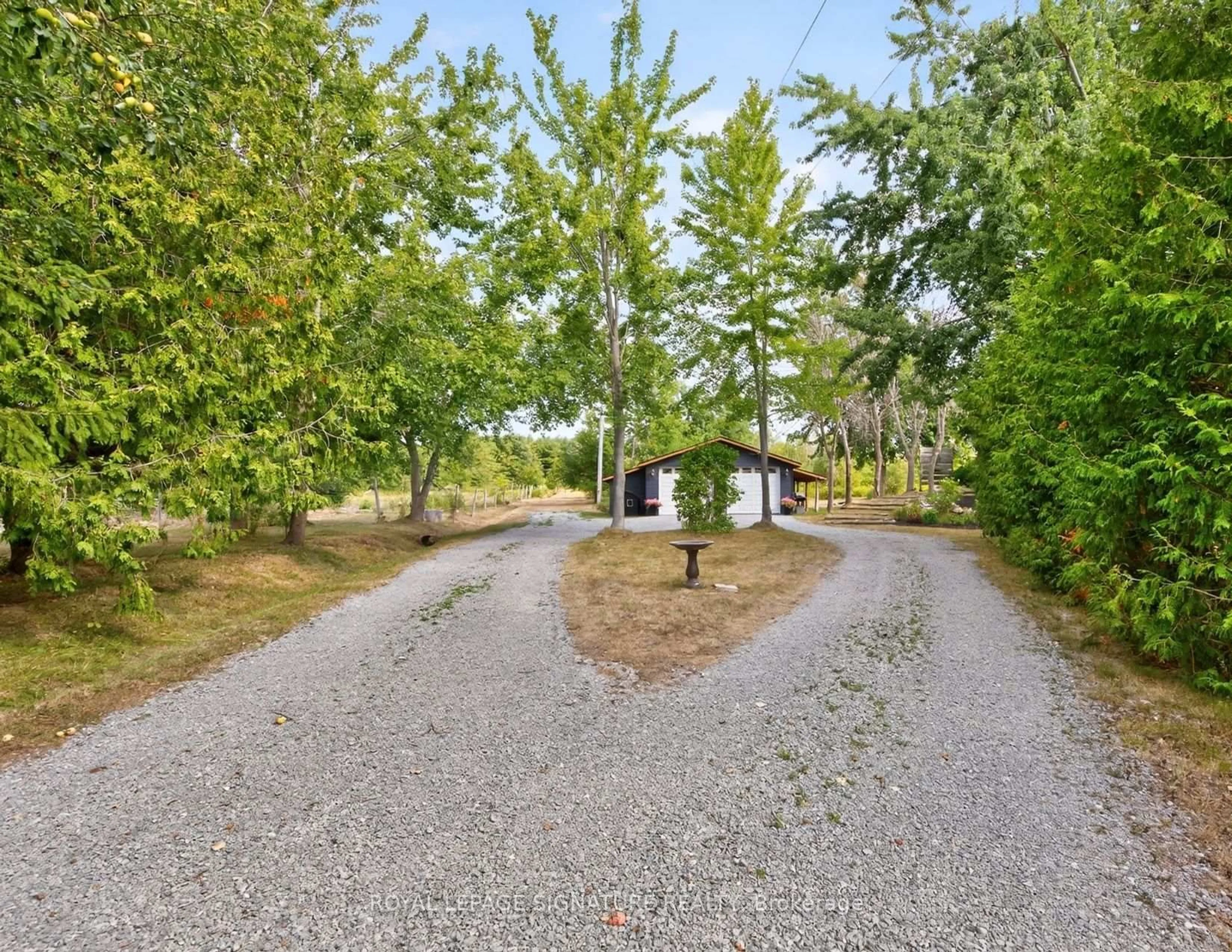 A pic from outside/outdoor area/front of a property/back of a property/a pic from drone, street for 1152 Concession Rd, Ramara Ontario L0K 1B0