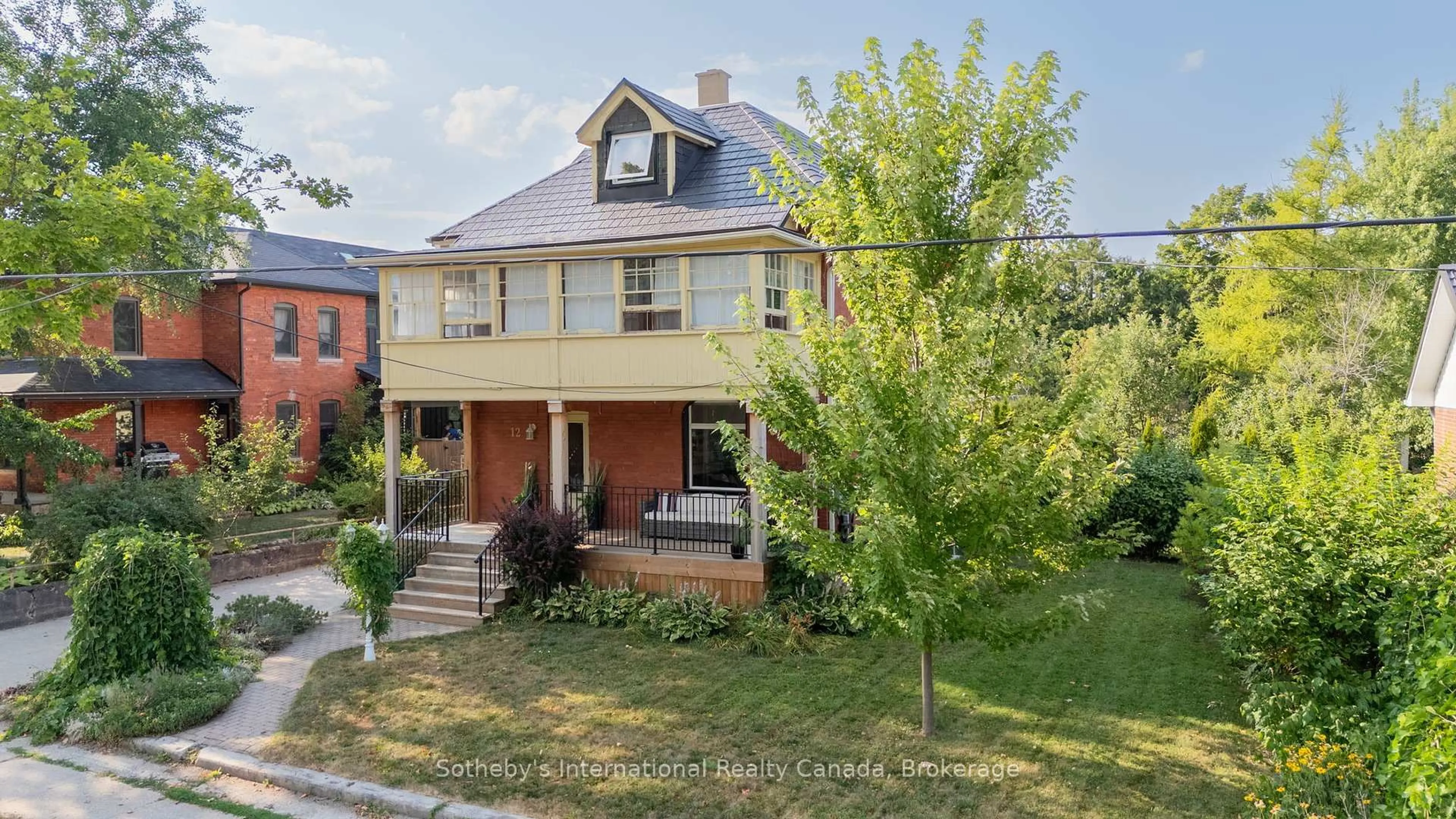 Home with brick exterior material, street for 12 Elizabeth St, Clearview Ontario L0M 1G0
