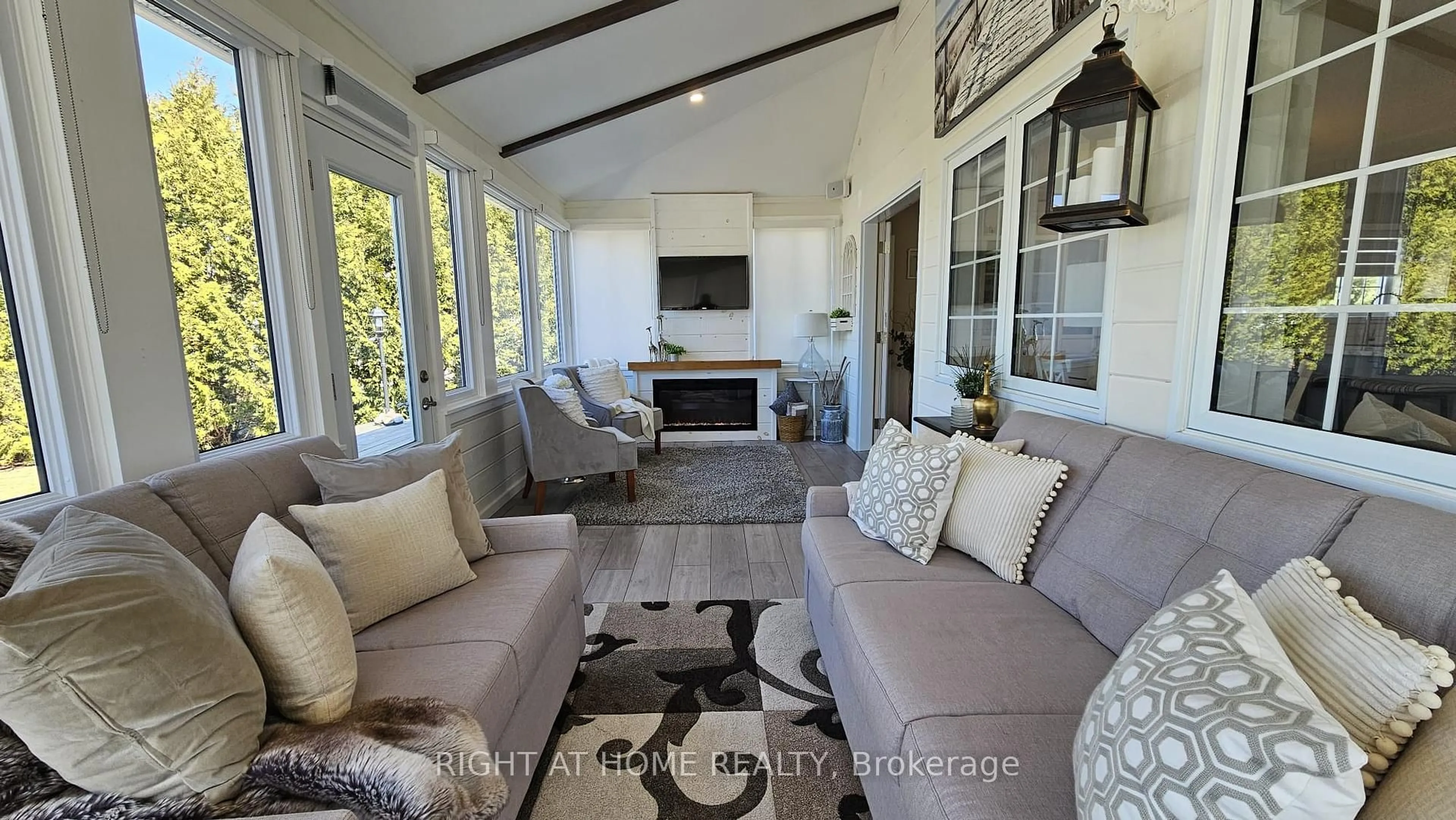 Living room with furniture, unknown for 38 MADAWASKA Tr, Wasaga Beach Ontario L9Z 1X7