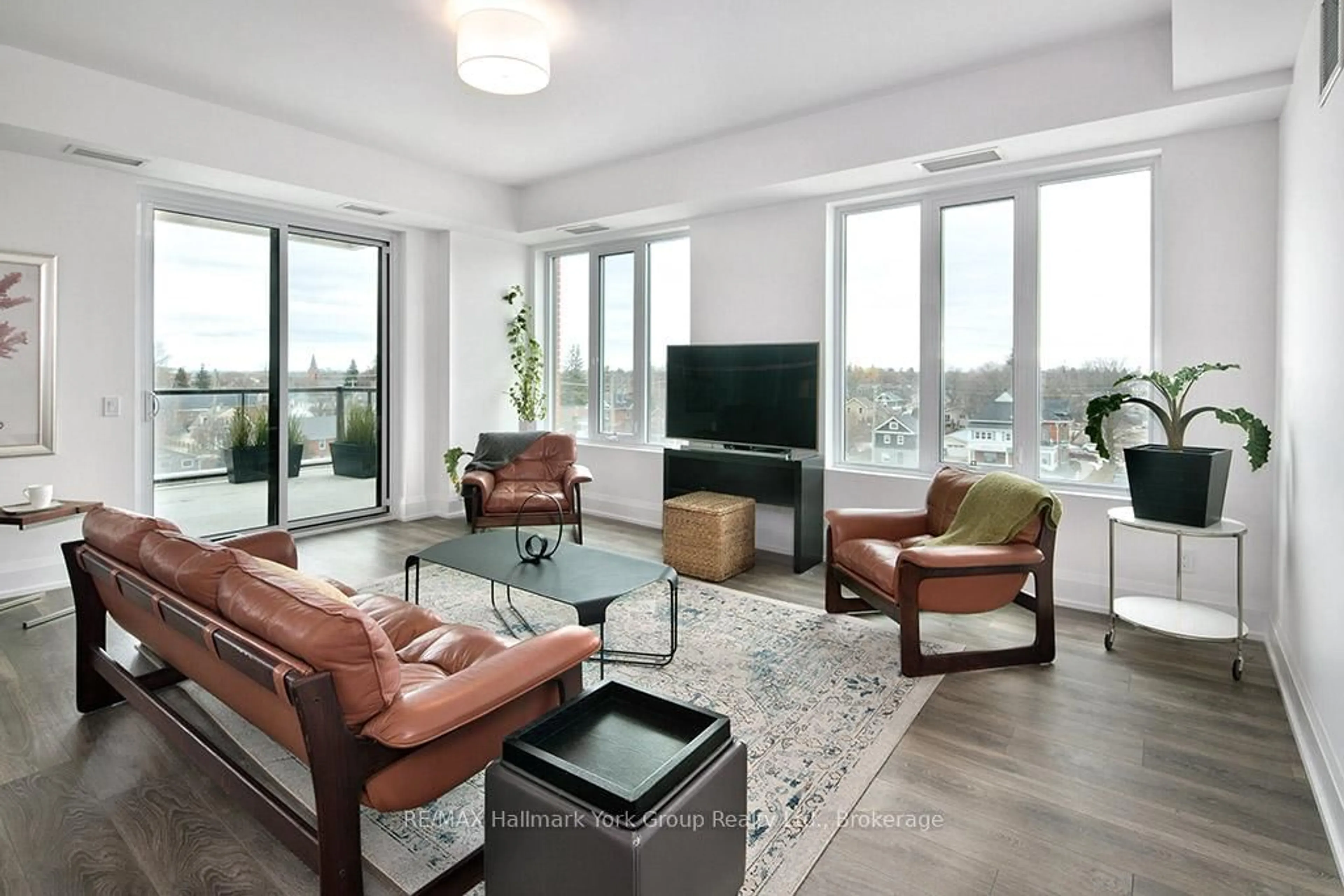 Living room with furniture, unknown for 1 Hume St #505, Collingwood Ontario L9Y 0X3