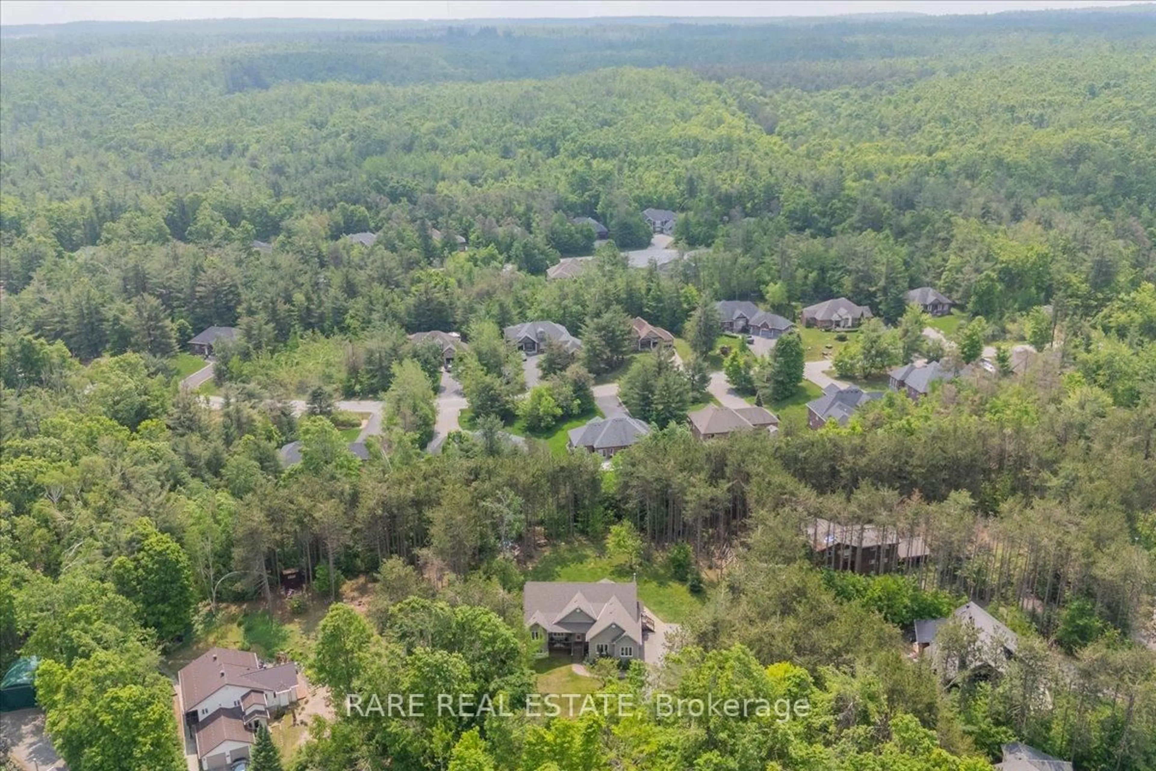 A pic from outside/outdoor area/front of a property/back of a property/a pic from drone, forest/trees view for 21 Monica Crt, Oro-Medonte Ontario L0K 1E0
