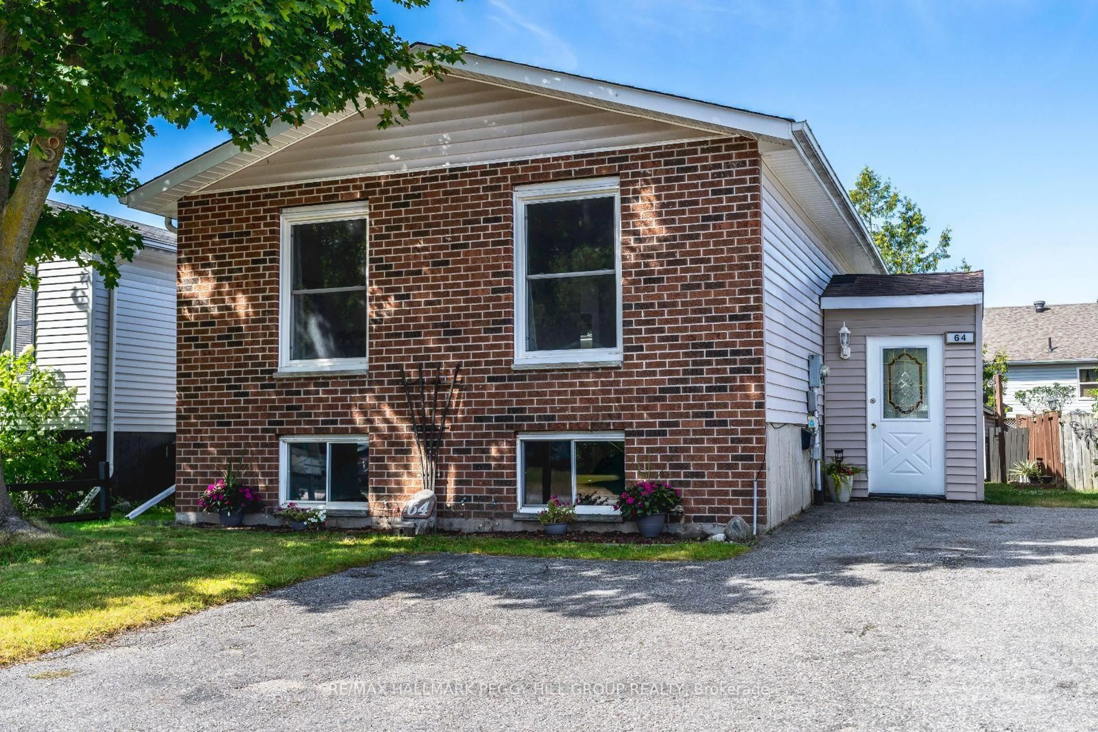 Home with brick exterior material, street for 64 Telfer Rd, Collingwood Ontario L9Y 4S2
