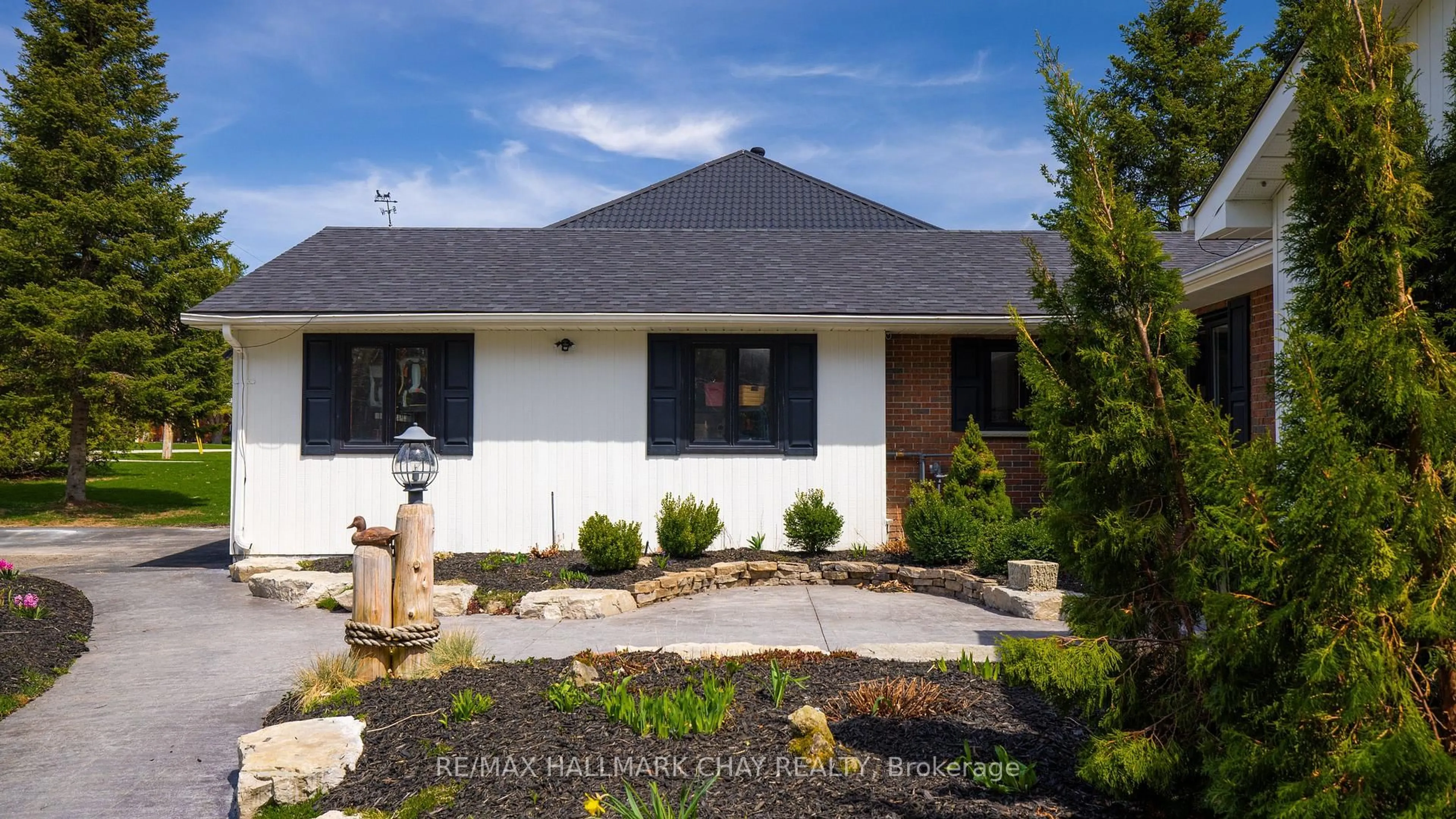 Home with vinyl exterior material, street for 7 Jodies Lane, Springwater Ontario L0L 1X1
