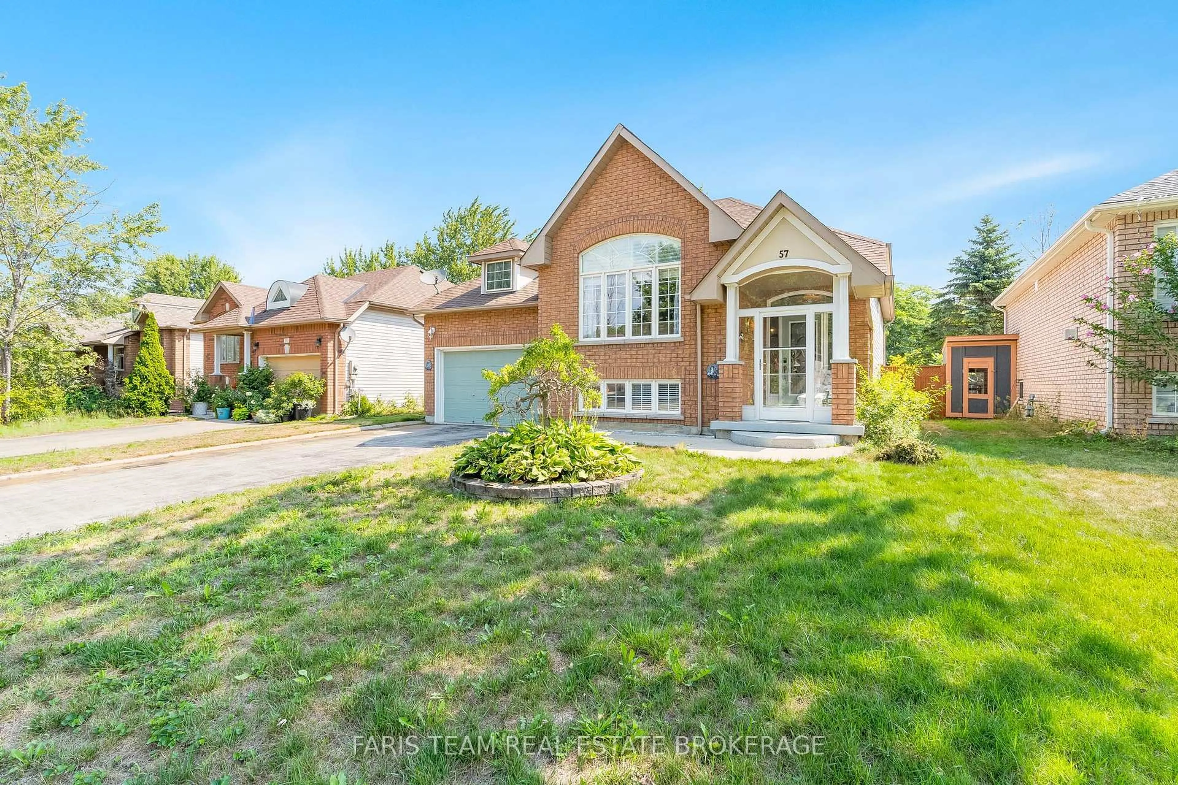 Home with brick exterior material, street for 57 Rose Valley Way, Wasaga Beach Ontario L9Z 3C4