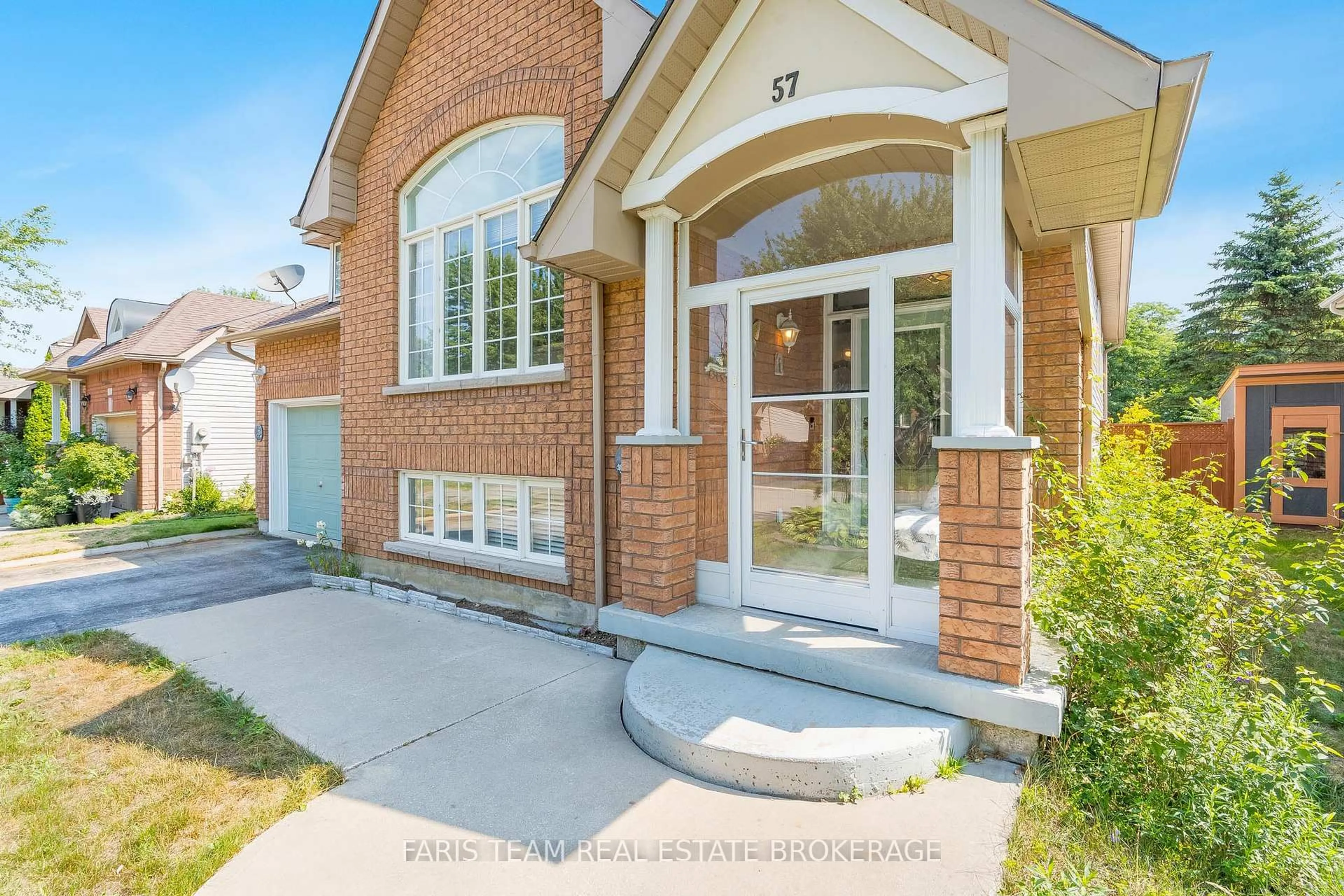 Home with brick exterior material, street for 57 Rose Valley Way, Wasaga Beach Ontario L9Z 3C4