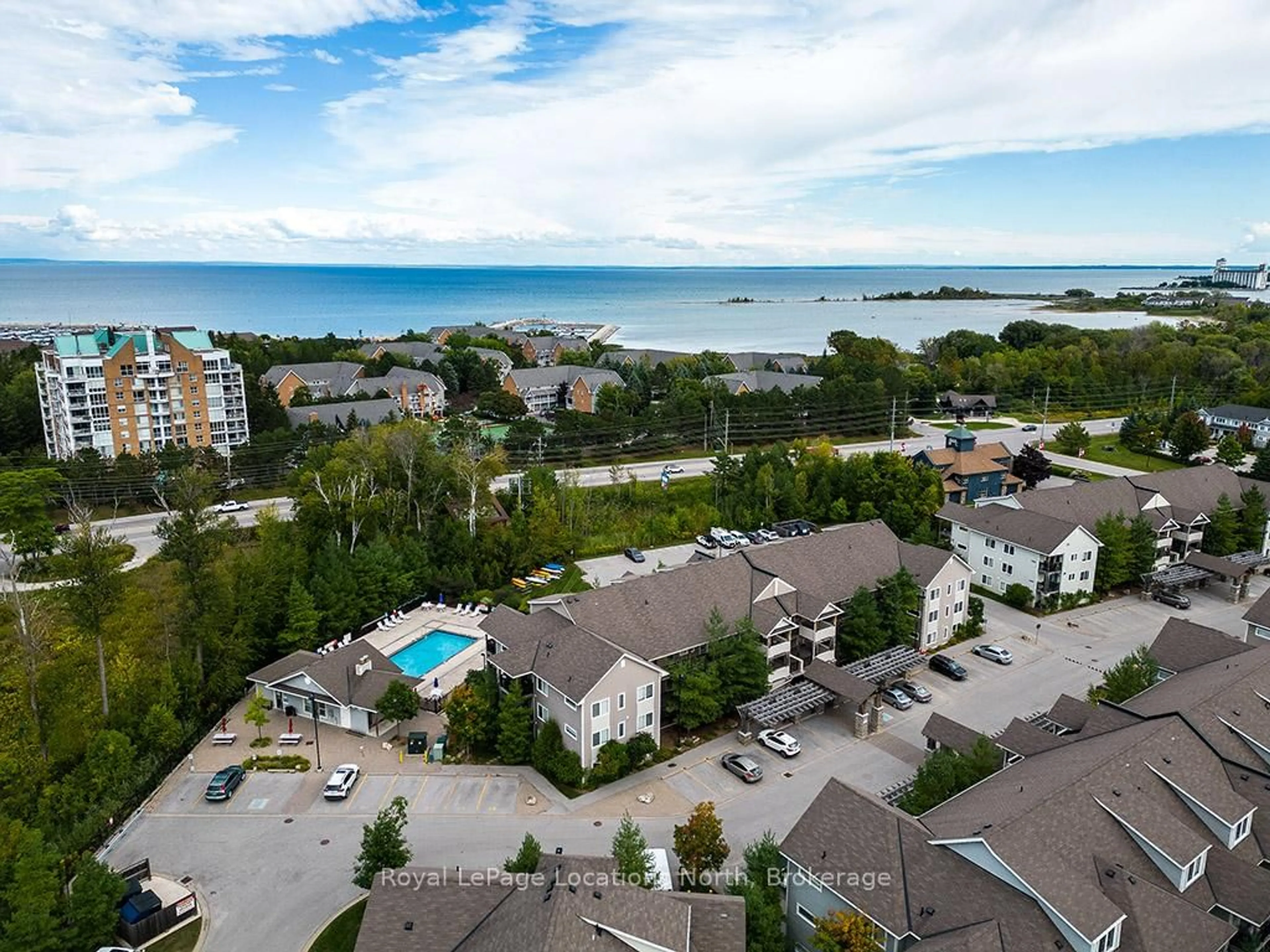 A pic from outside/outdoor area/front of a property/back of a property/a pic from drone, water/lake/river/ocean view for 3 Brandy Lane Dr #305, Collingwood Ontario L9Y 0X4