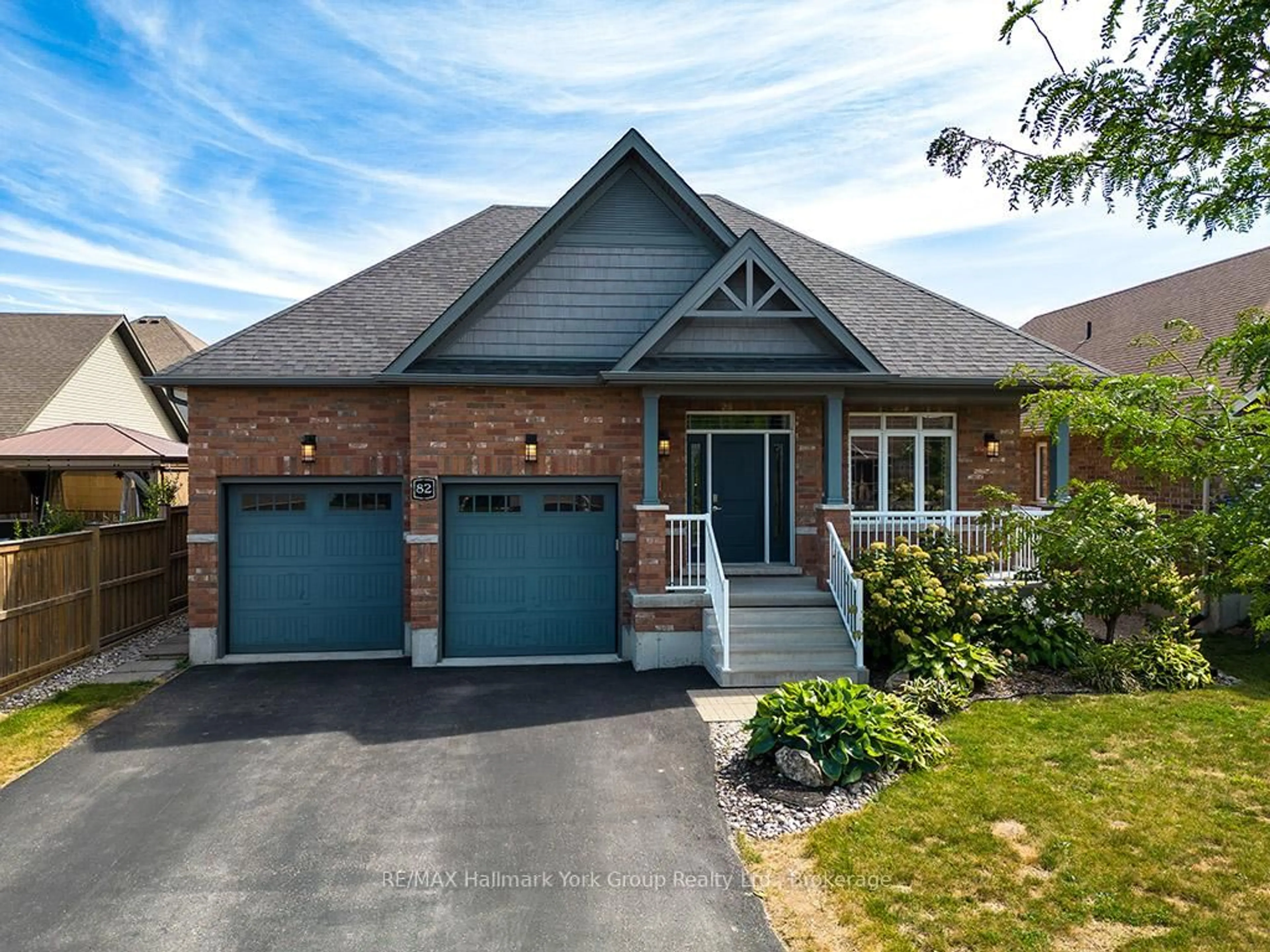 Home with brick exterior material, street for 82 Hughes St, Collingwood Ontario L9Y 0W7