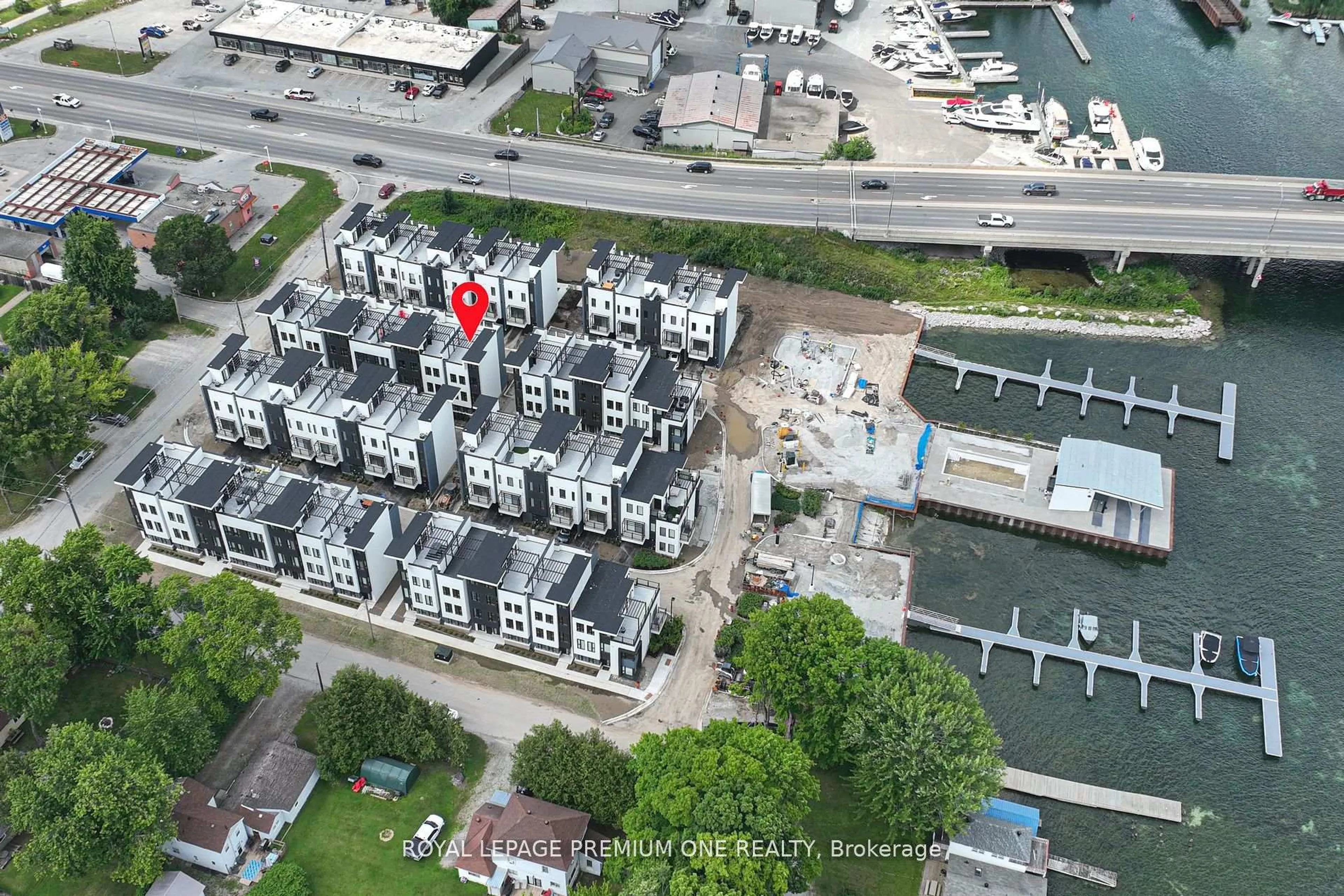 A pic from outside/outdoor area/front of a property/back of a property/a pic from drone, unknown for 12 Mariners Pier Way, Orillia Ontario L3V 8P4