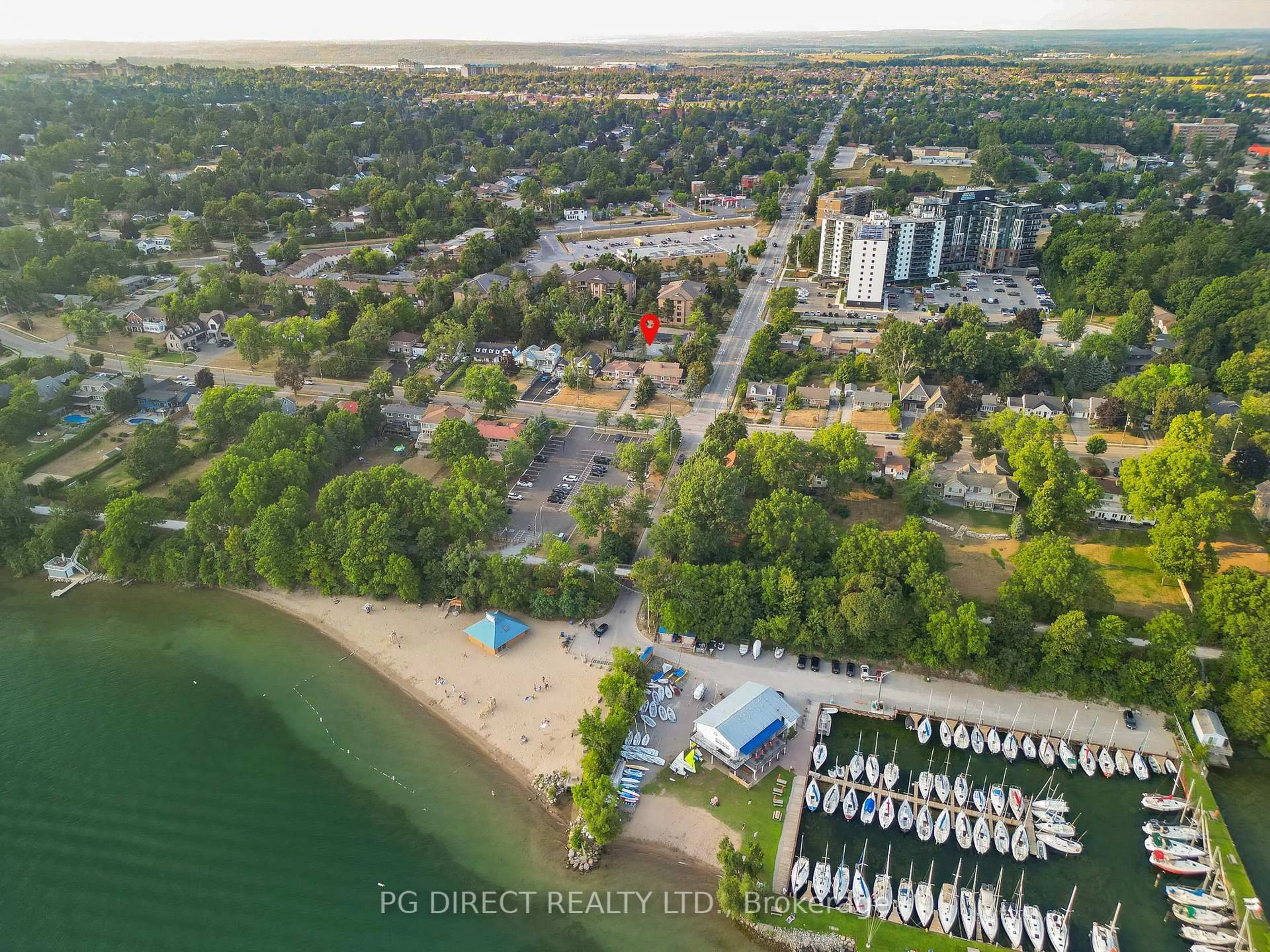 A pic from outside/outdoor area/front of a property/back of a property/a pic from drone, water/lake/river/ocean view for 28 Johnson St, Barrie Ontario L4M 6C4
