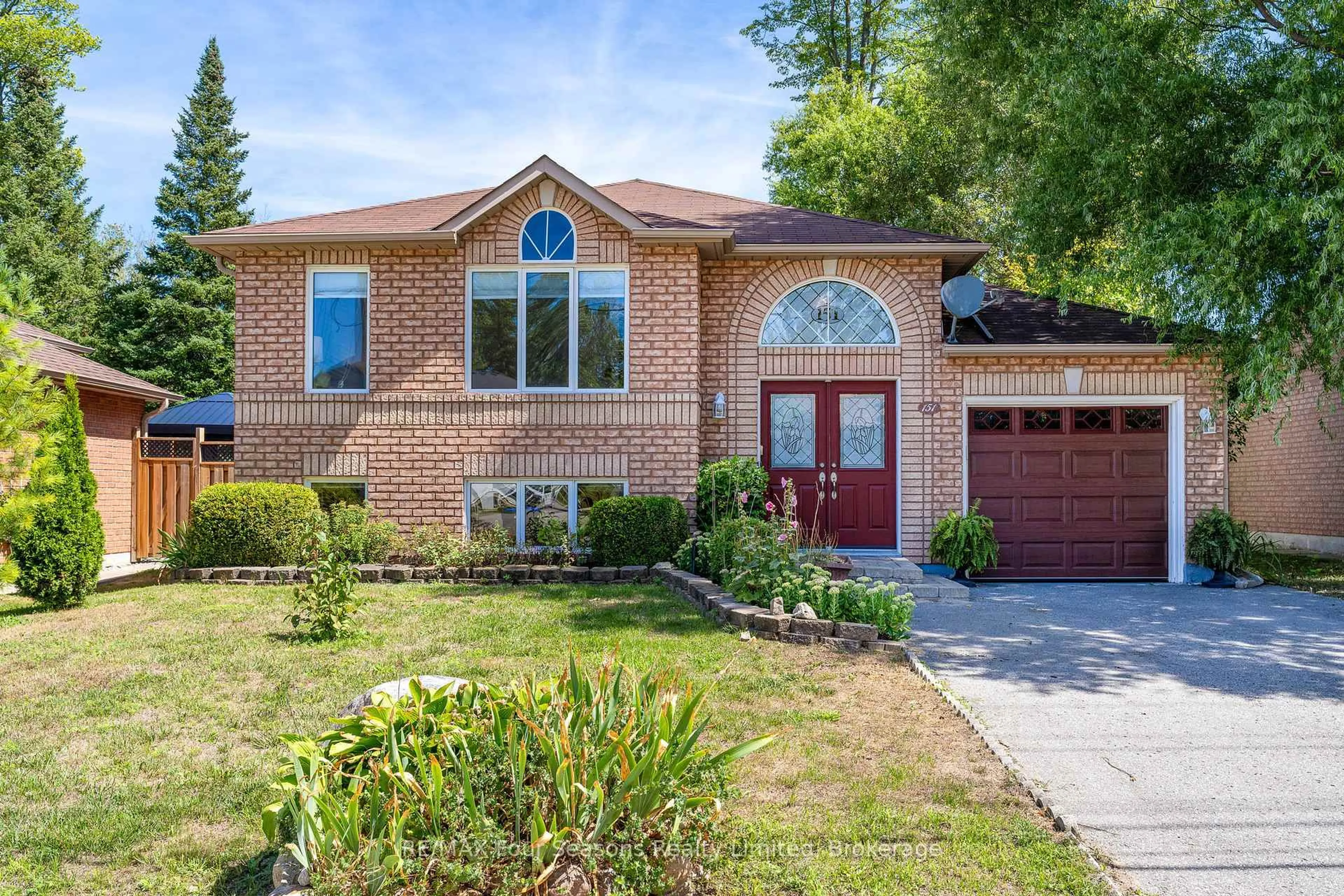 Home with brick exterior material, street for 151 58th St, Wasaga Beach Ontario L9Z 1N9