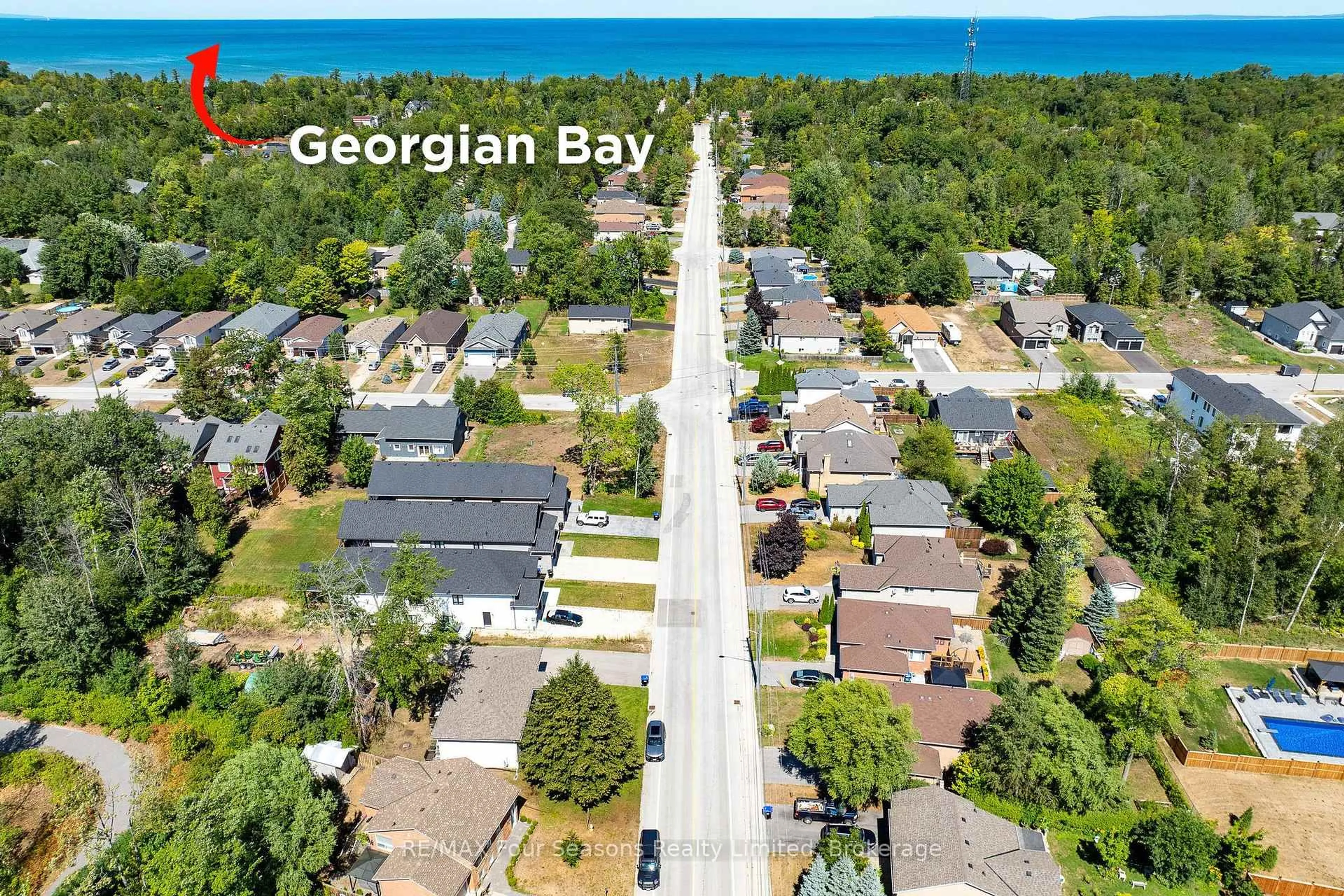 A pic from outside/outdoor area/front of a property/back of a property/a pic from drone, street for 151 58th St, Wasaga Beach Ontario L9Z 1N9