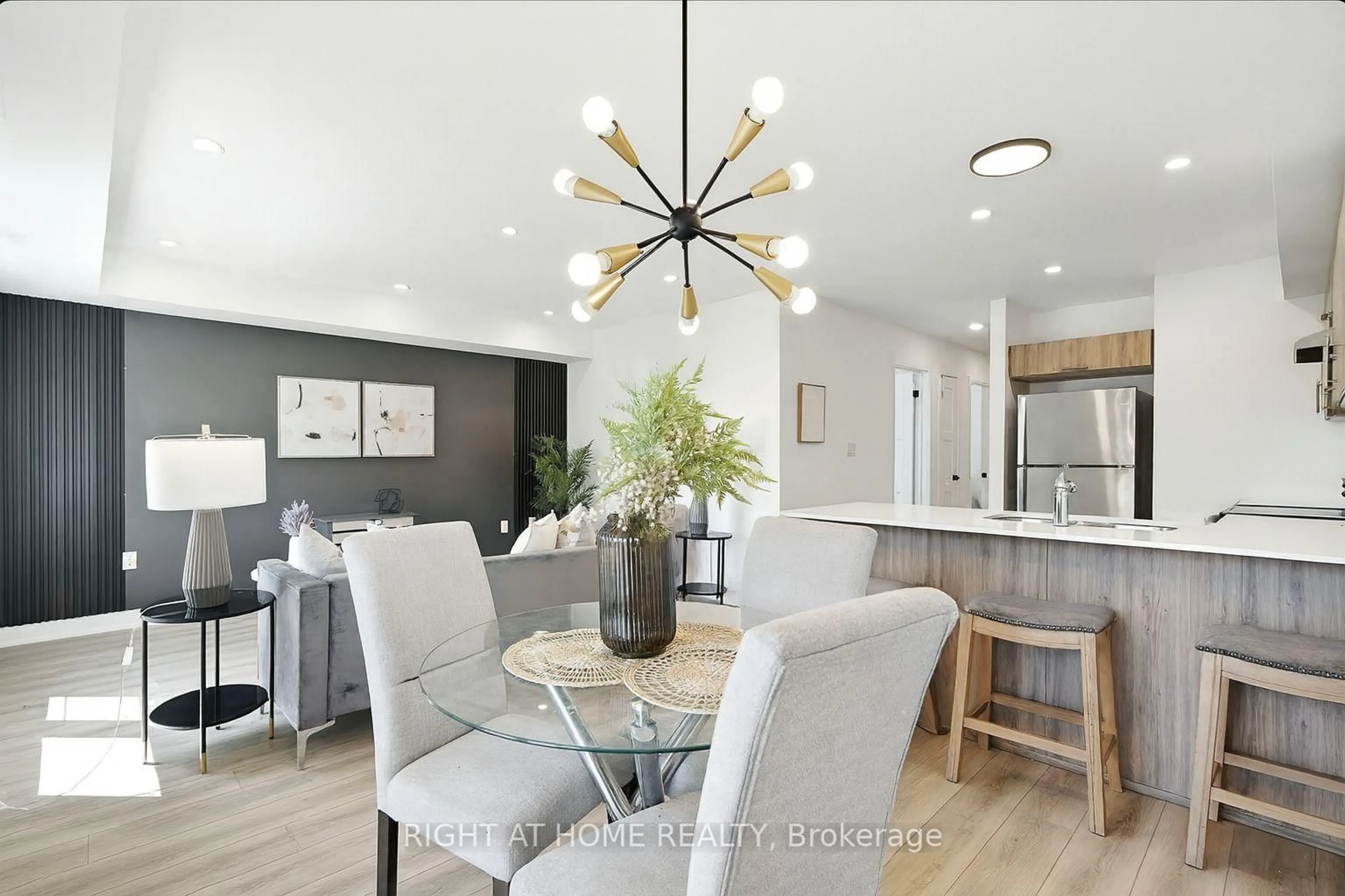 Open concept kitchen, wood/laminate floor for 53 Pumpkin Corner Cres #3, Barrie Ontario L9J 0C2