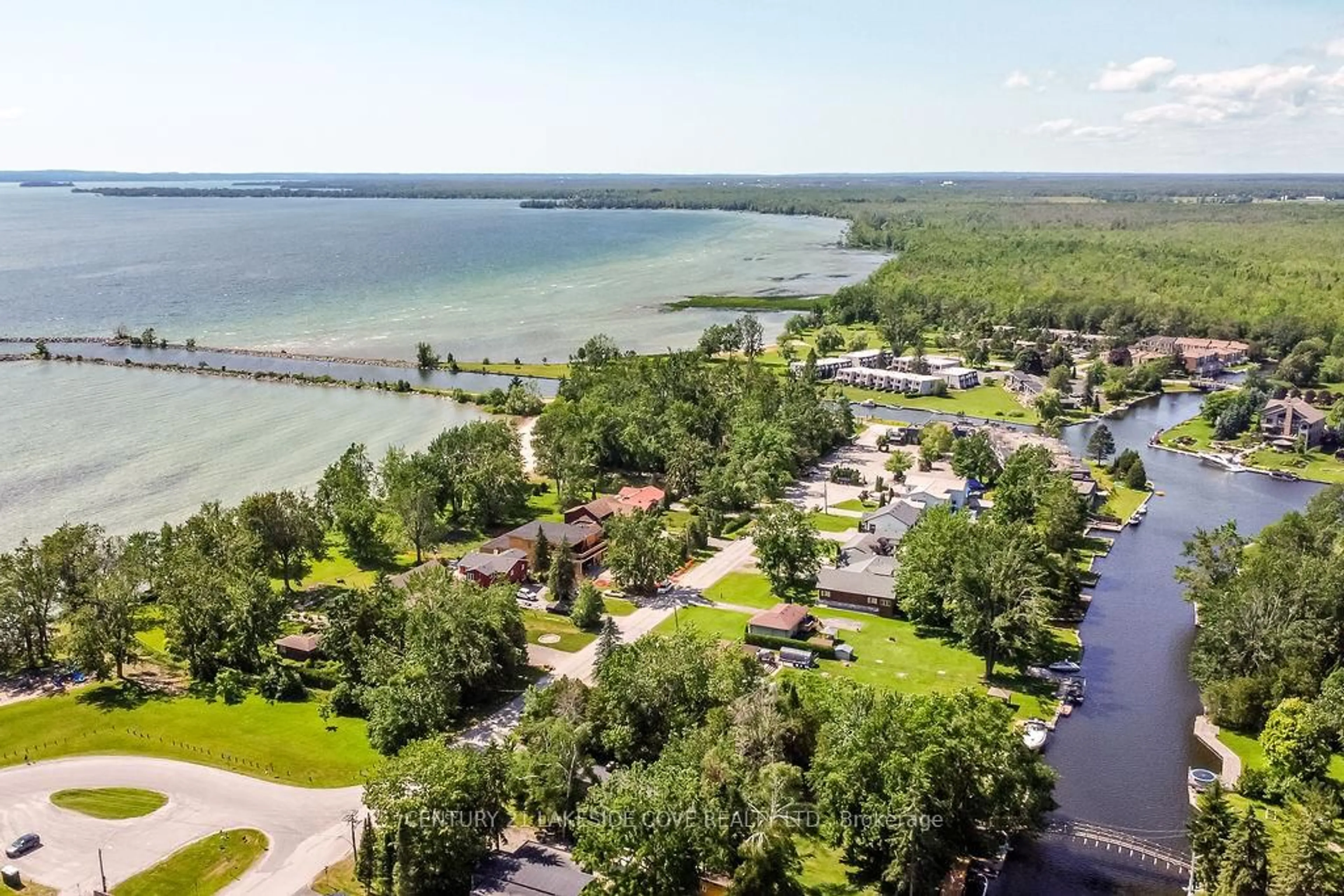 A pic from outside/outdoor area/front of a property/back of a property/a pic from drone, water/lake/river/ocean view for 27 Poplar Cres, Ramara Ontario L0K 1B0