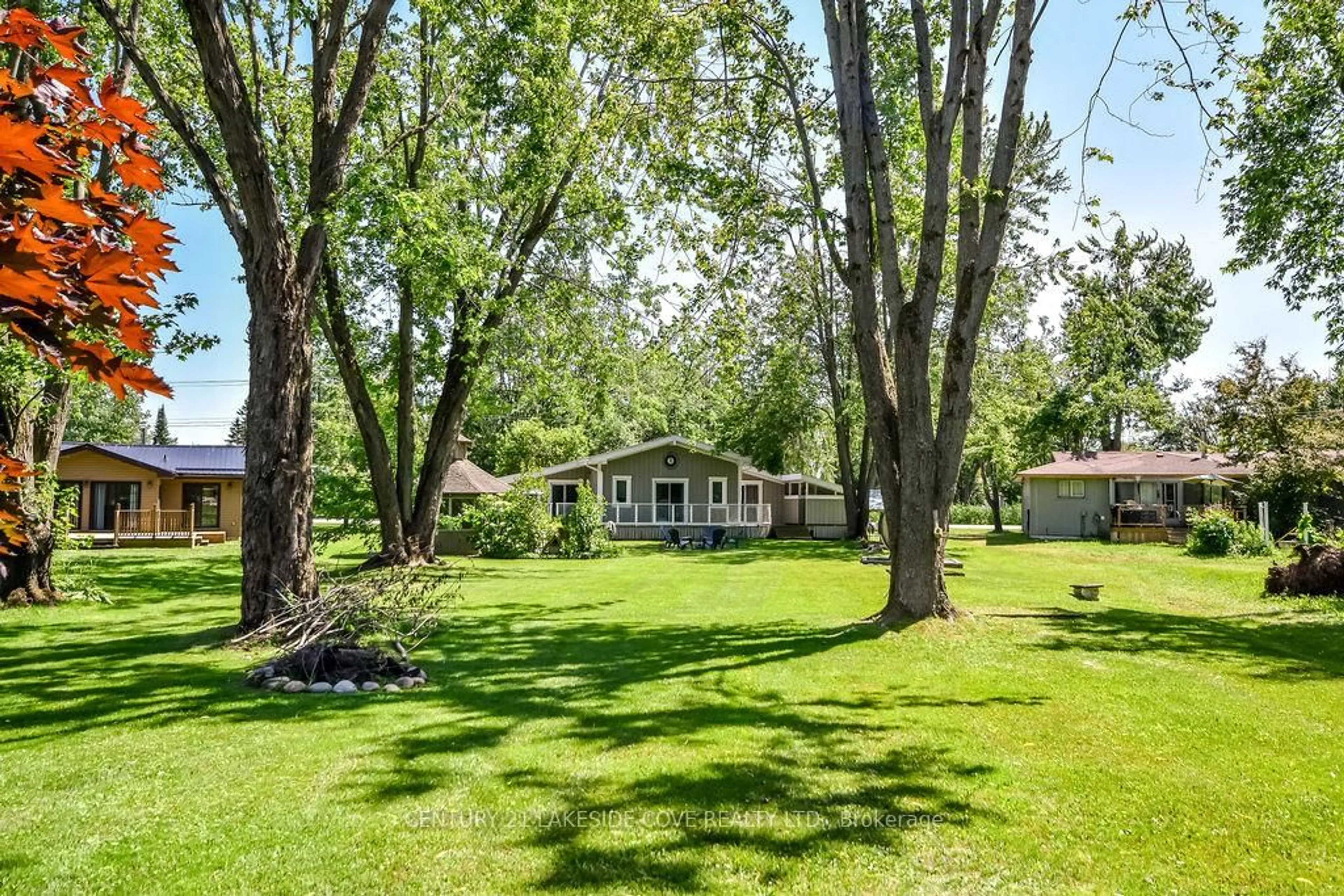 A pic from outside/outdoor area/front of a property/back of a property/a pic from drone, water/lake/river/ocean view for 27 Poplar Cres, Ramara Ontario L0K 1B0
