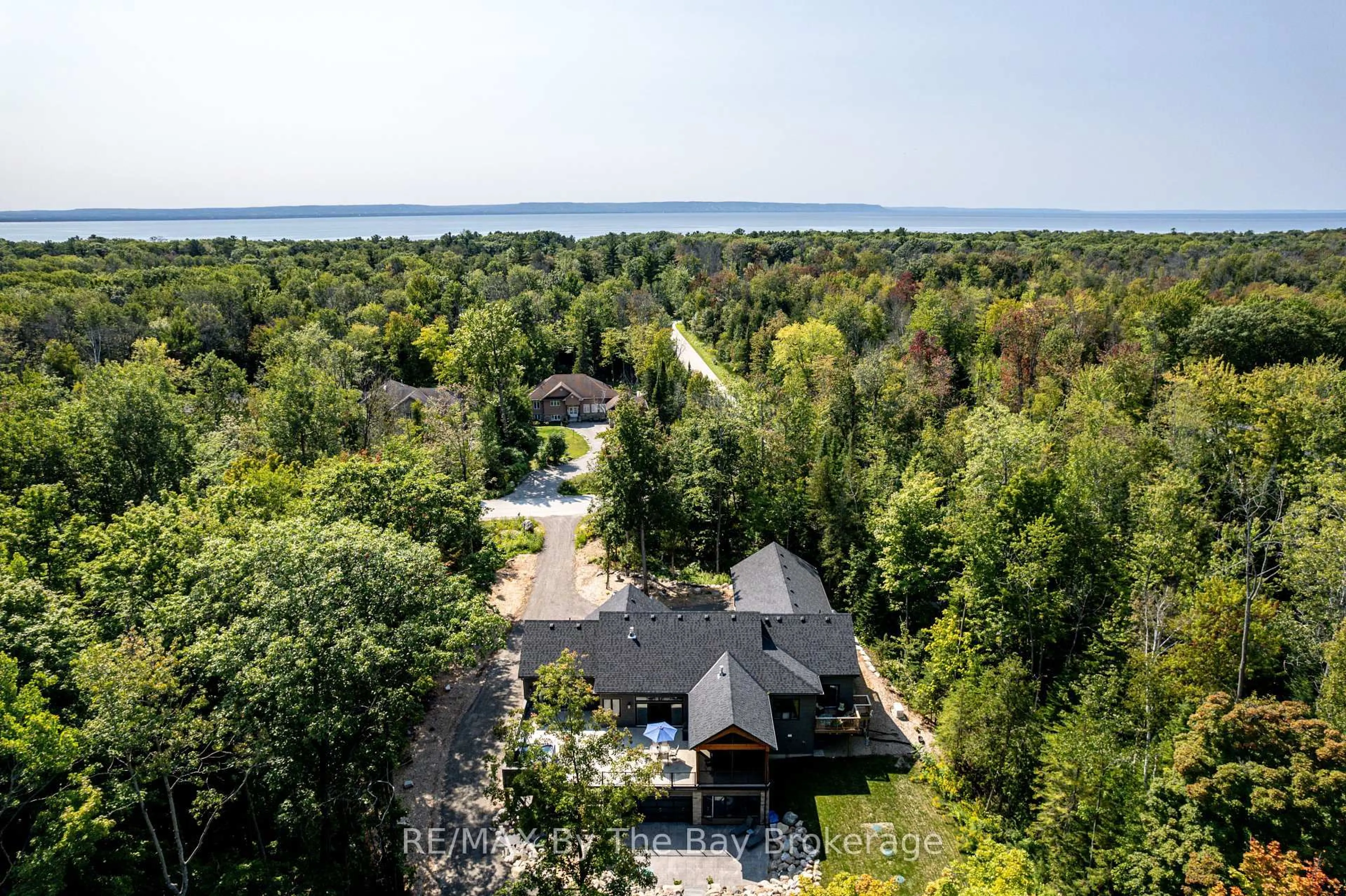 A pic from outside/outdoor area/front of a property/back of a property/a pic from drone, water/lake/river/ocean view for 95 Spruce St, Tiny Ontario L0L 1P1