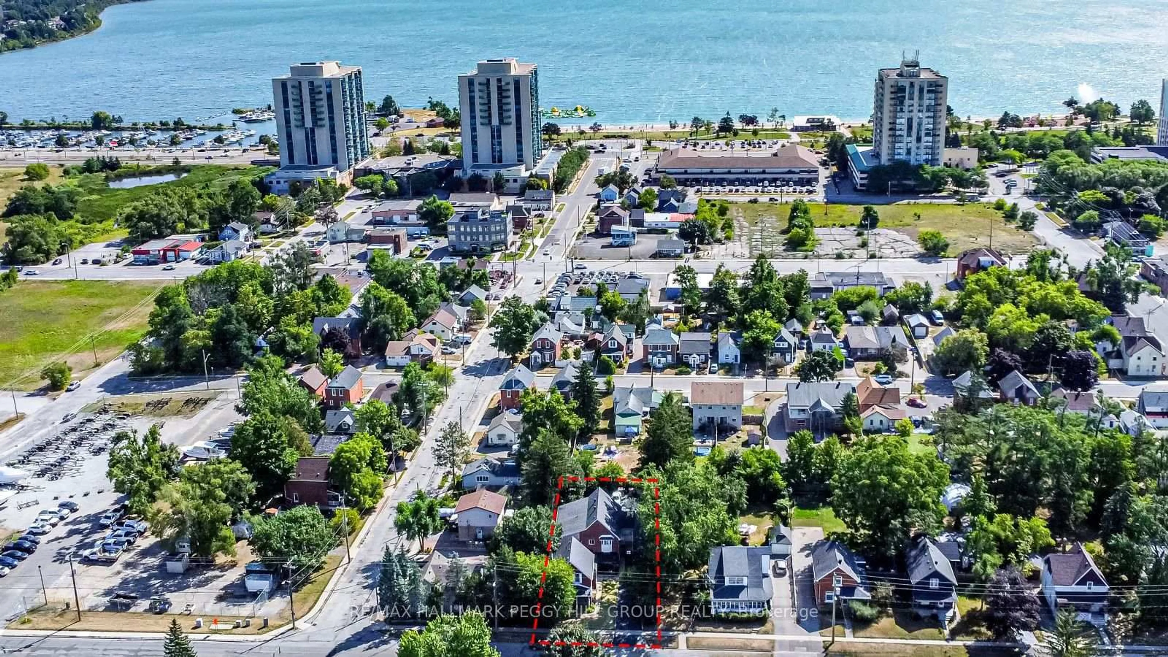 A pic from outside/outdoor area/front of a property/back of a property/a pic from drone, water/lake/river/ocean view for 81 Innisfil St, Barrie Ontario L4N 3E3