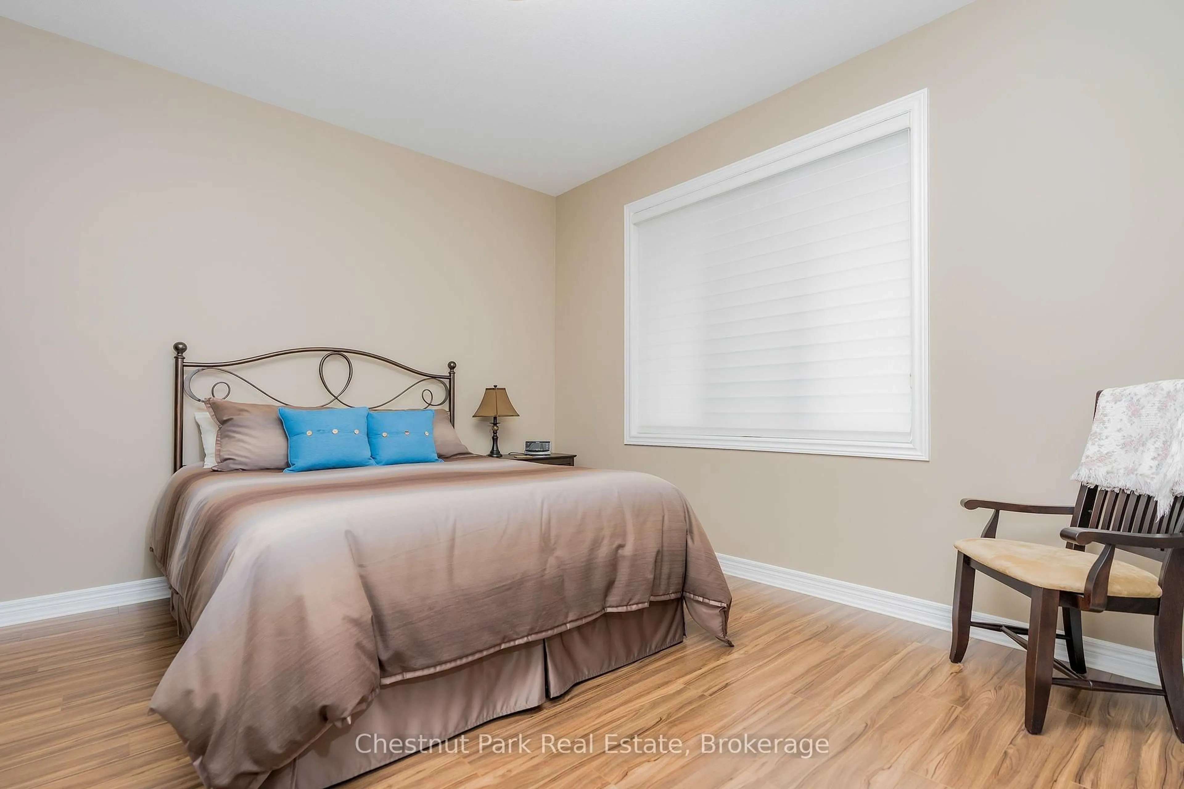 Bedroom with bed, wood/laminate floor for 21 Portland St, Collingwood Ontario L9Y 0W9