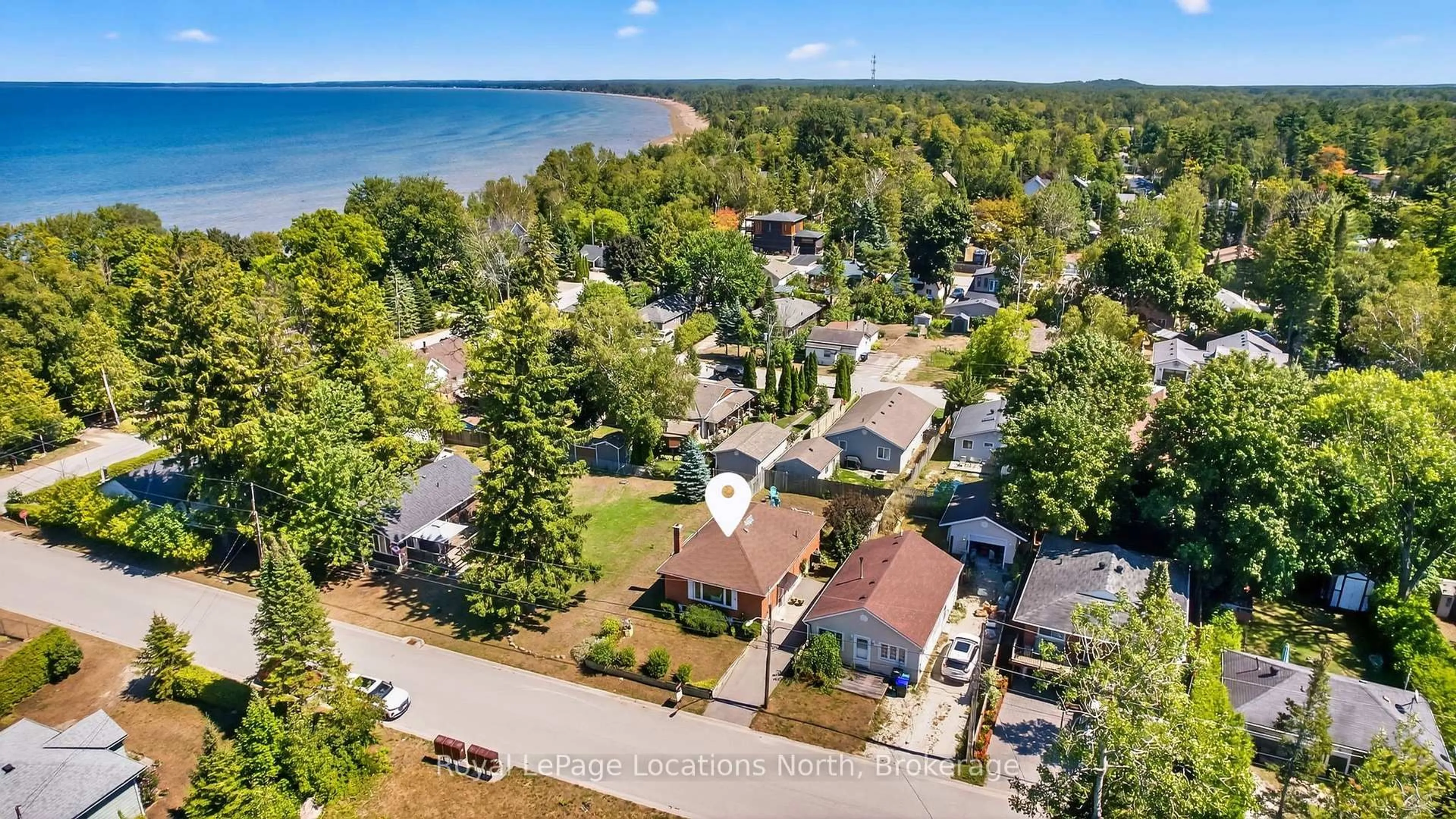 A pic from outside/outdoor area/front of a property/back of a property/a pic from drone, water/lake/river/ocean view for 19 70th St, Wasaga Beach Ontario L9Z 1T6