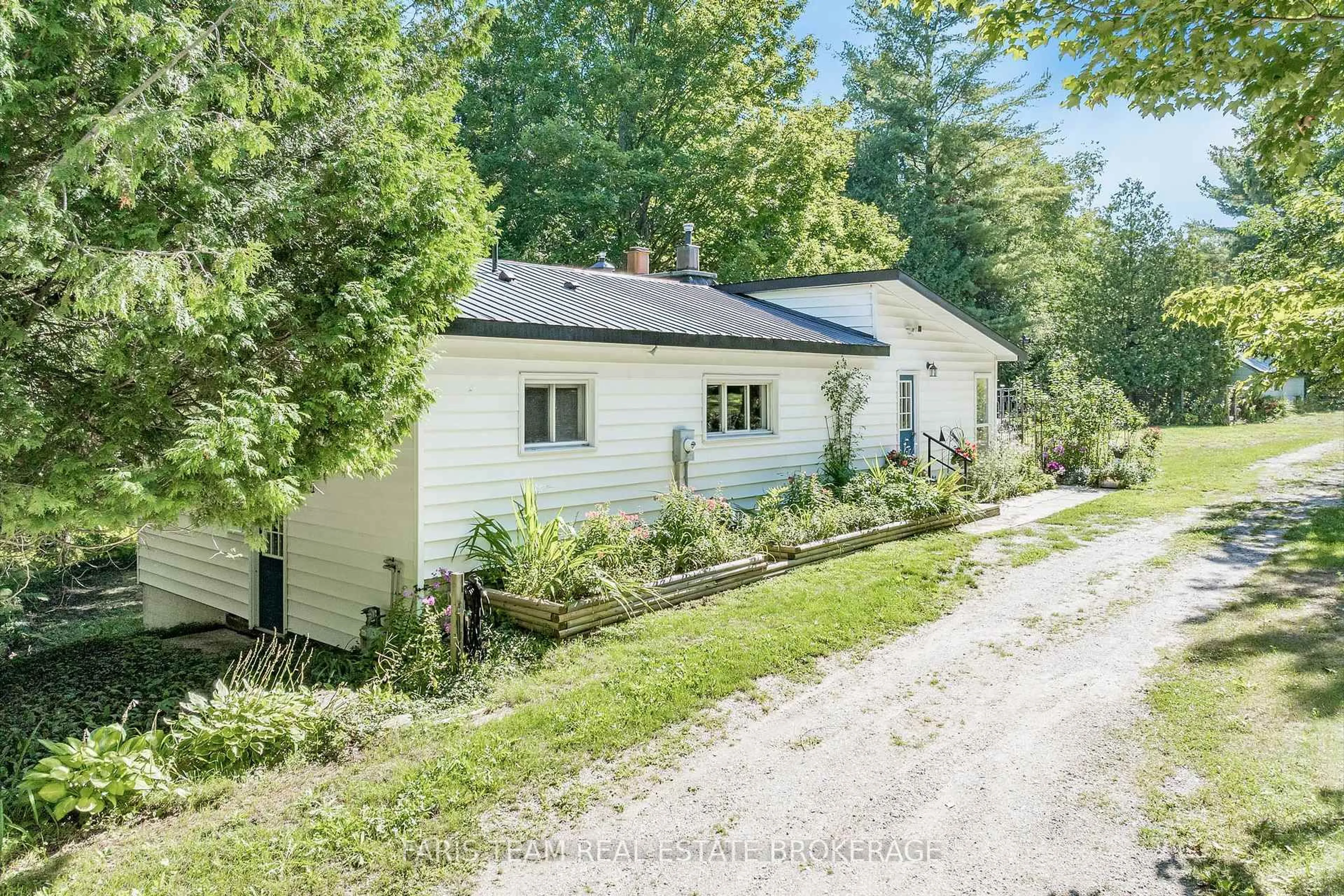 A pic from outside/outdoor area/front of a property/back of a property/a pic from drone, street for 1983 Horseshoe Valley Rd, Oro-Medonte Ontario L4M 4Y8