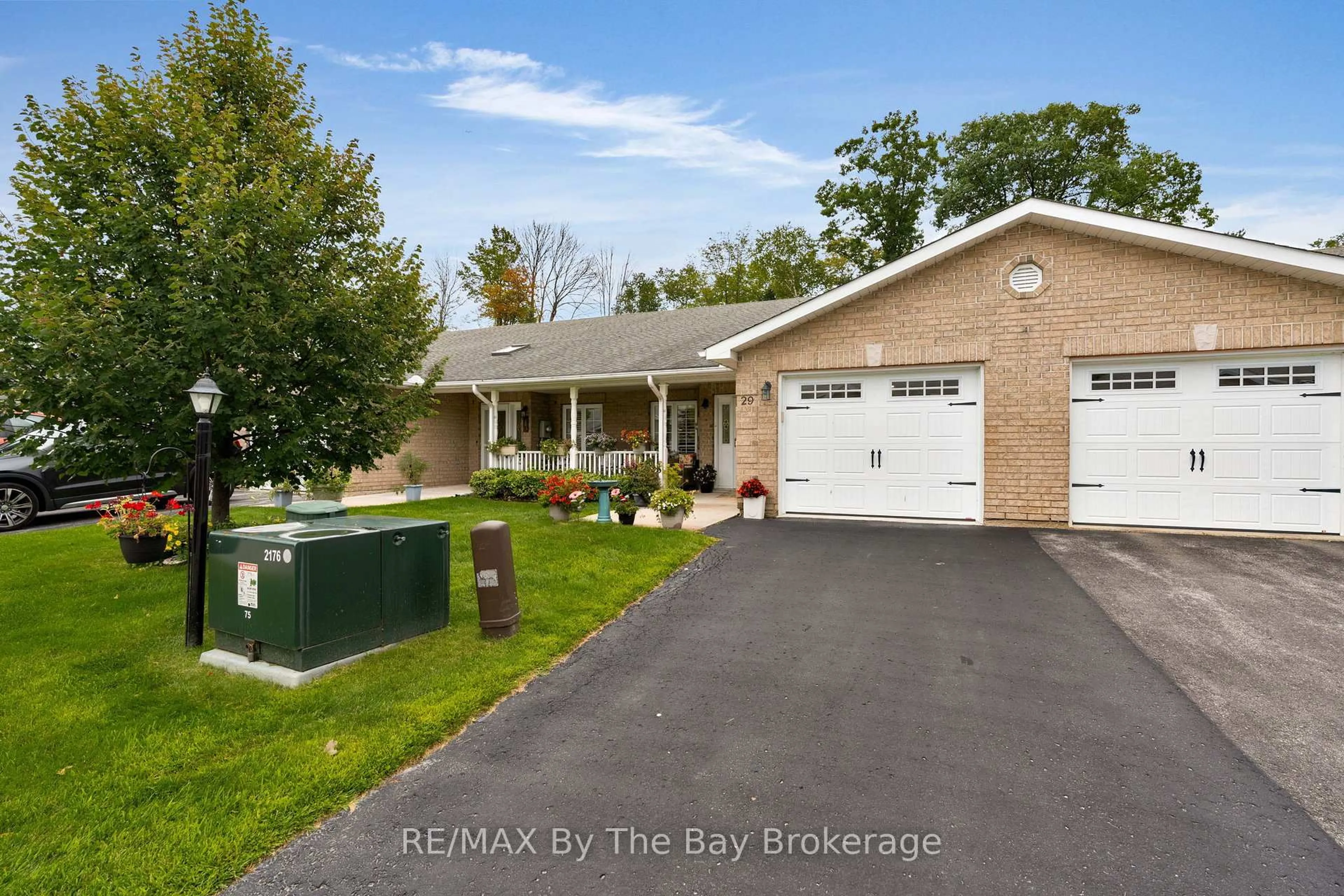 Home with brick exterior material, street for 29 MEADOW Lane, Wasaga Beach Ontario L9Z 0A4