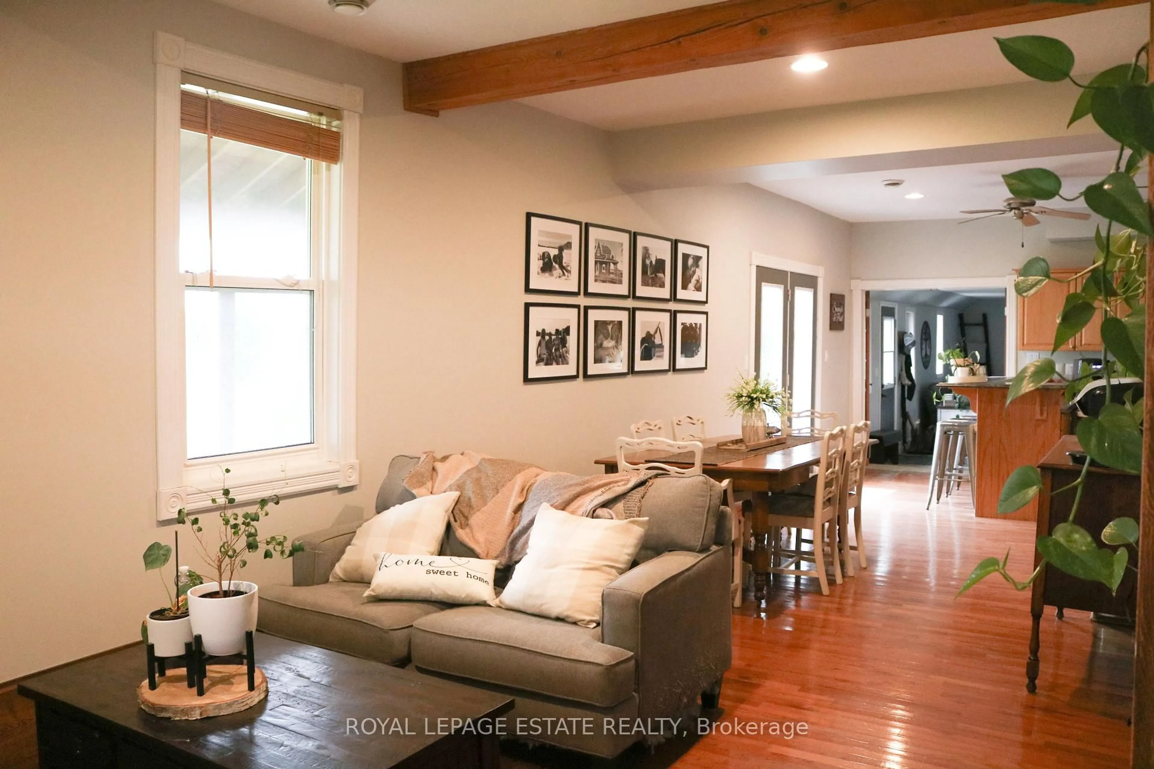 Living room with furniture, unknown for 4295 Horseshoe Valley Rd, Springwater Ontario L9X 1G1