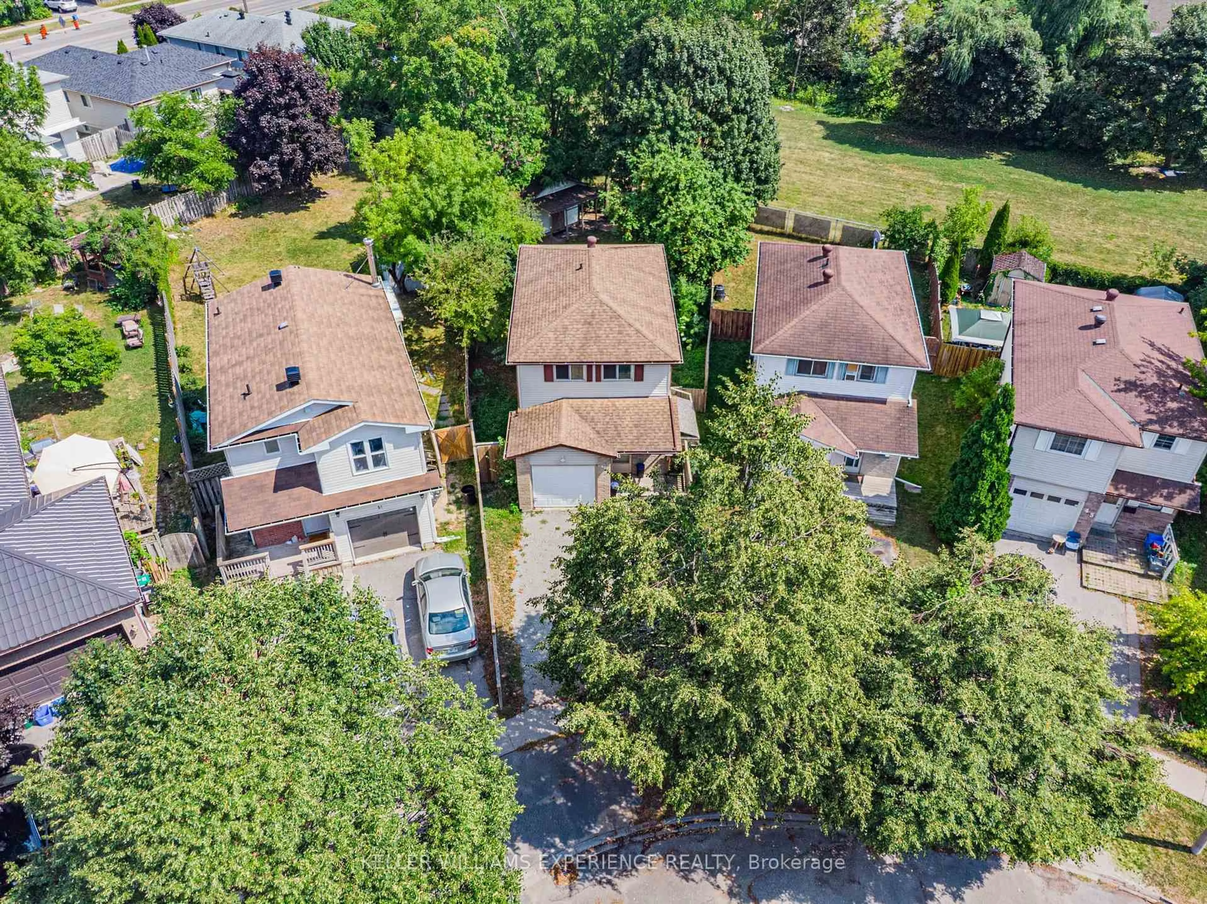 A pic from outside/outdoor area/front of a property/back of a property/a pic from drone, street for 49 Laurie Cres, Barrie Ontario L4M 6C7