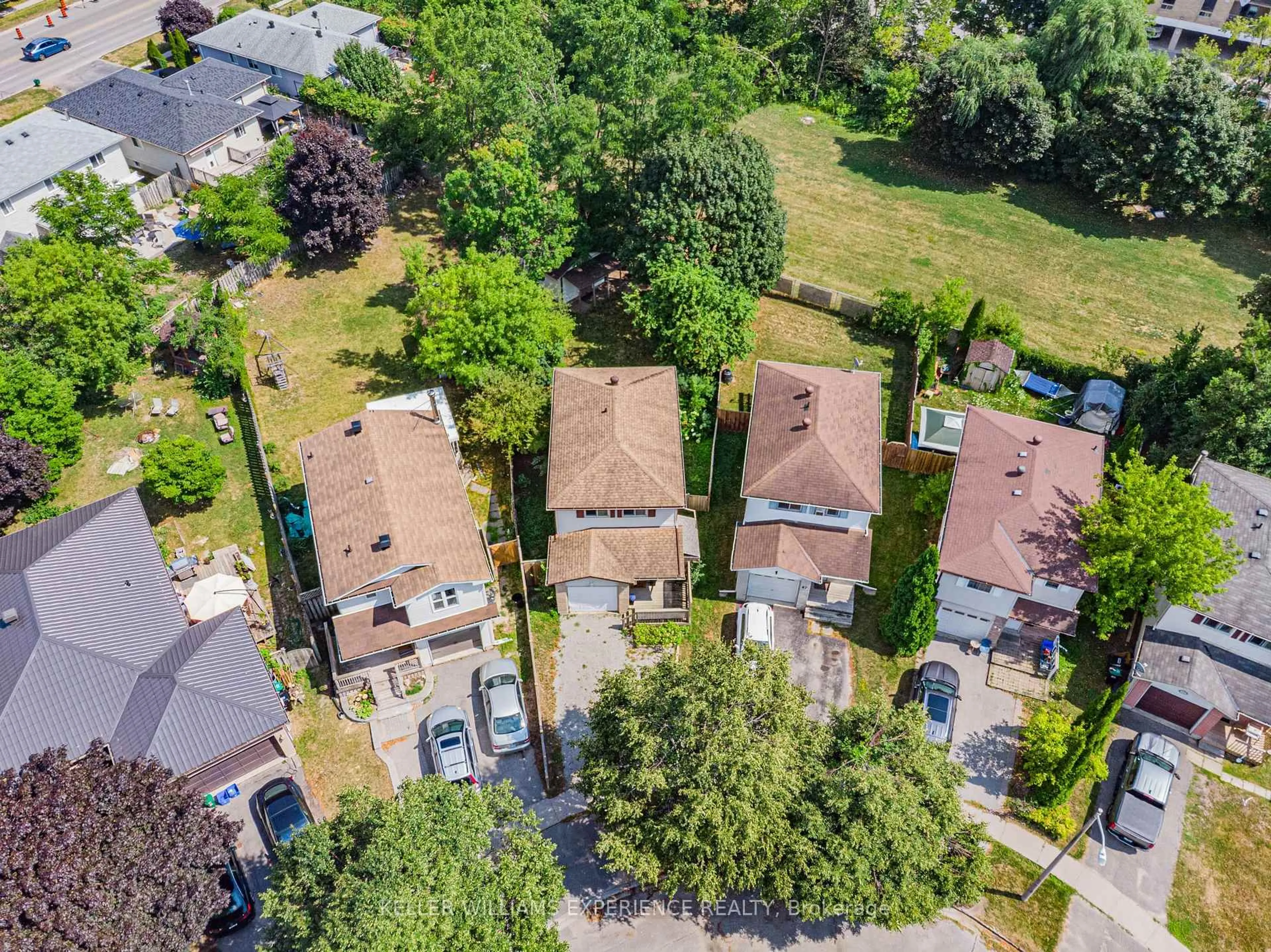 A pic from outside/outdoor area/front of a property/back of a property/a pic from drone, street for 49 Laurie Cres, Barrie Ontario L4M 6C7