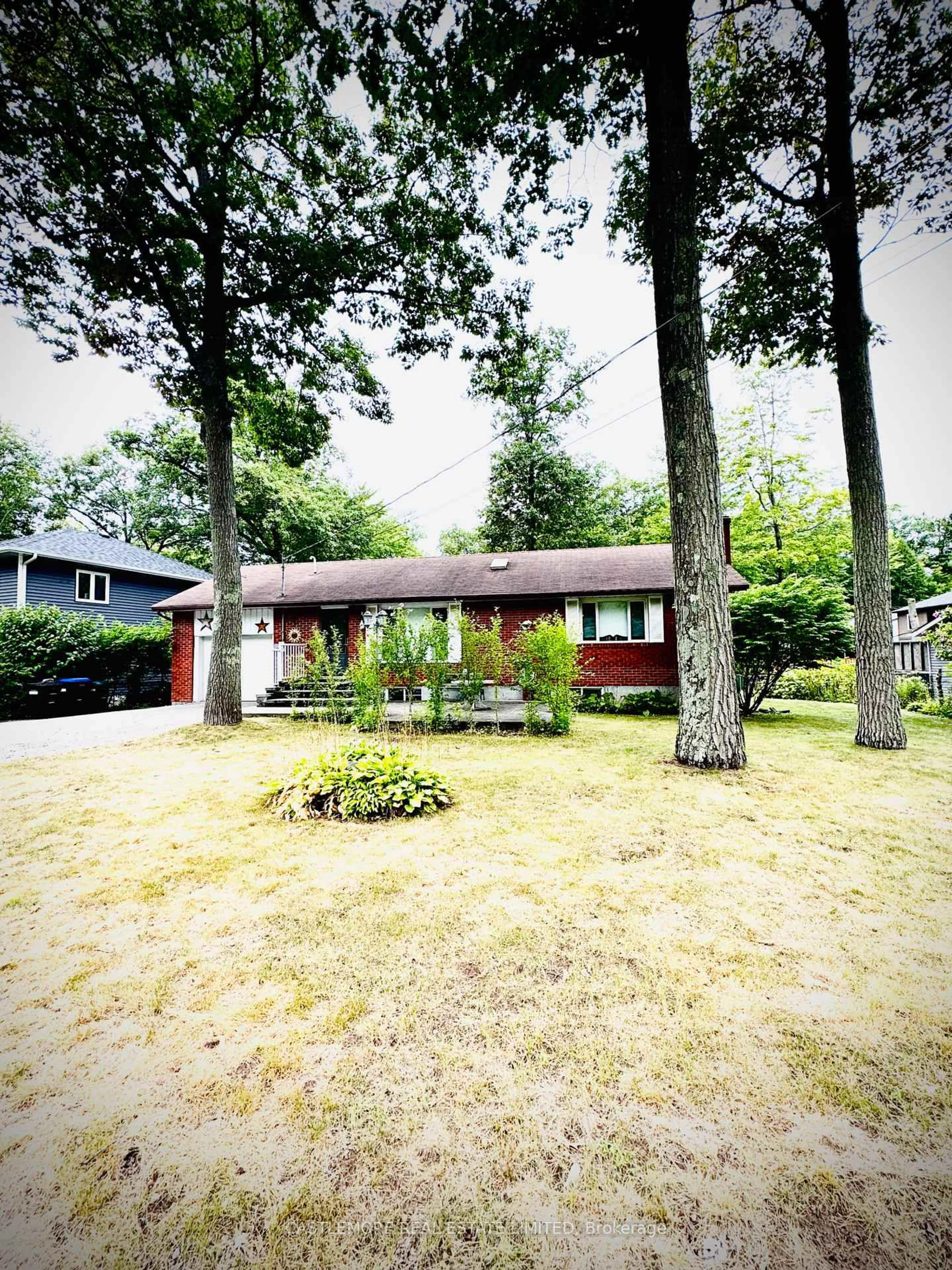 A pic from outside/outdoor area/front of a property/back of a property/a pic from drone, street for 10 Cabell Rd, Tiny Ontario L0L 1P0