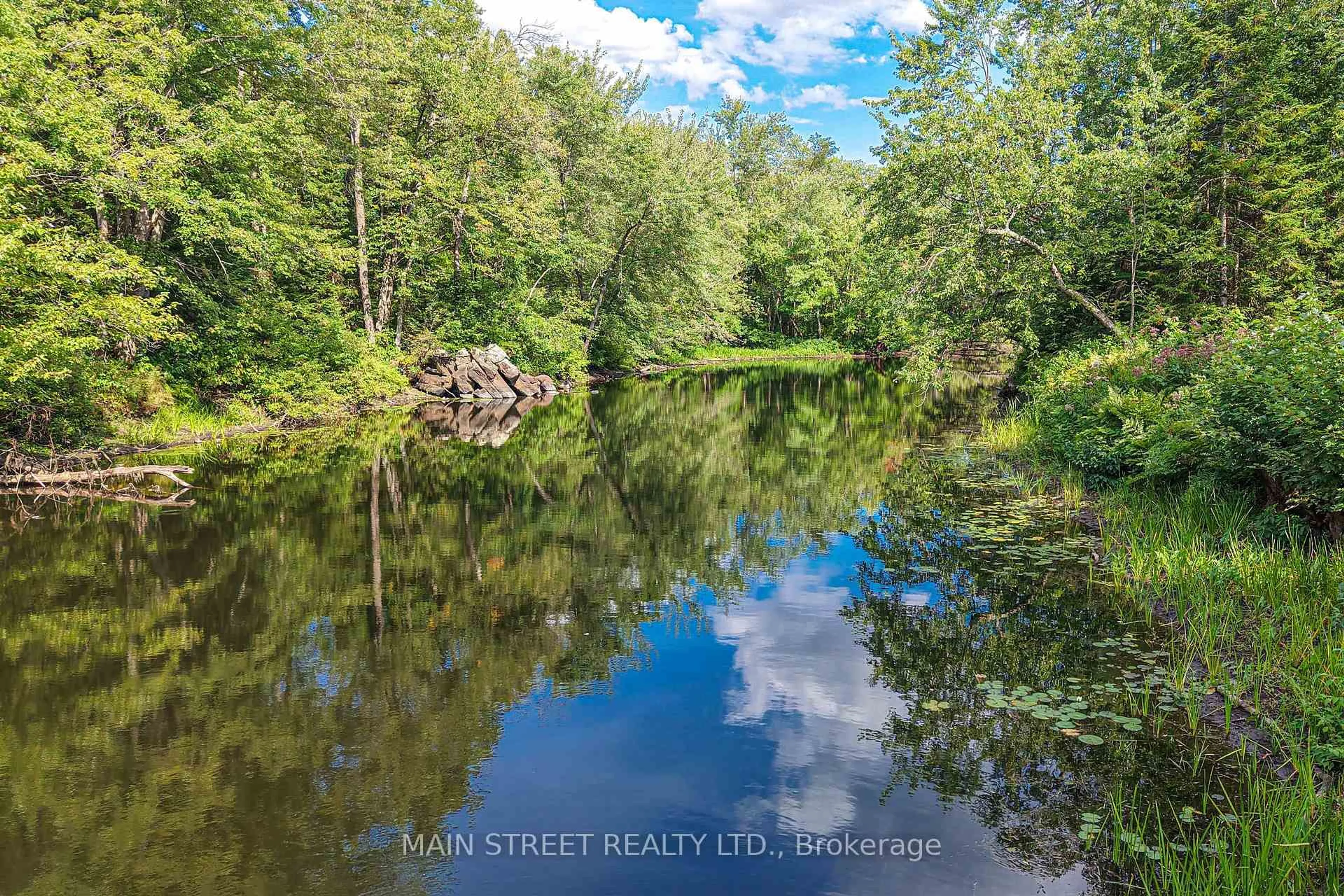 A pic from outside/outdoor area/front of a property/back of a property/a pic from drone, water/lake/river/ocean view for 6583 Pioneer Village Lane, Ramara Ontario L0K 1W0
