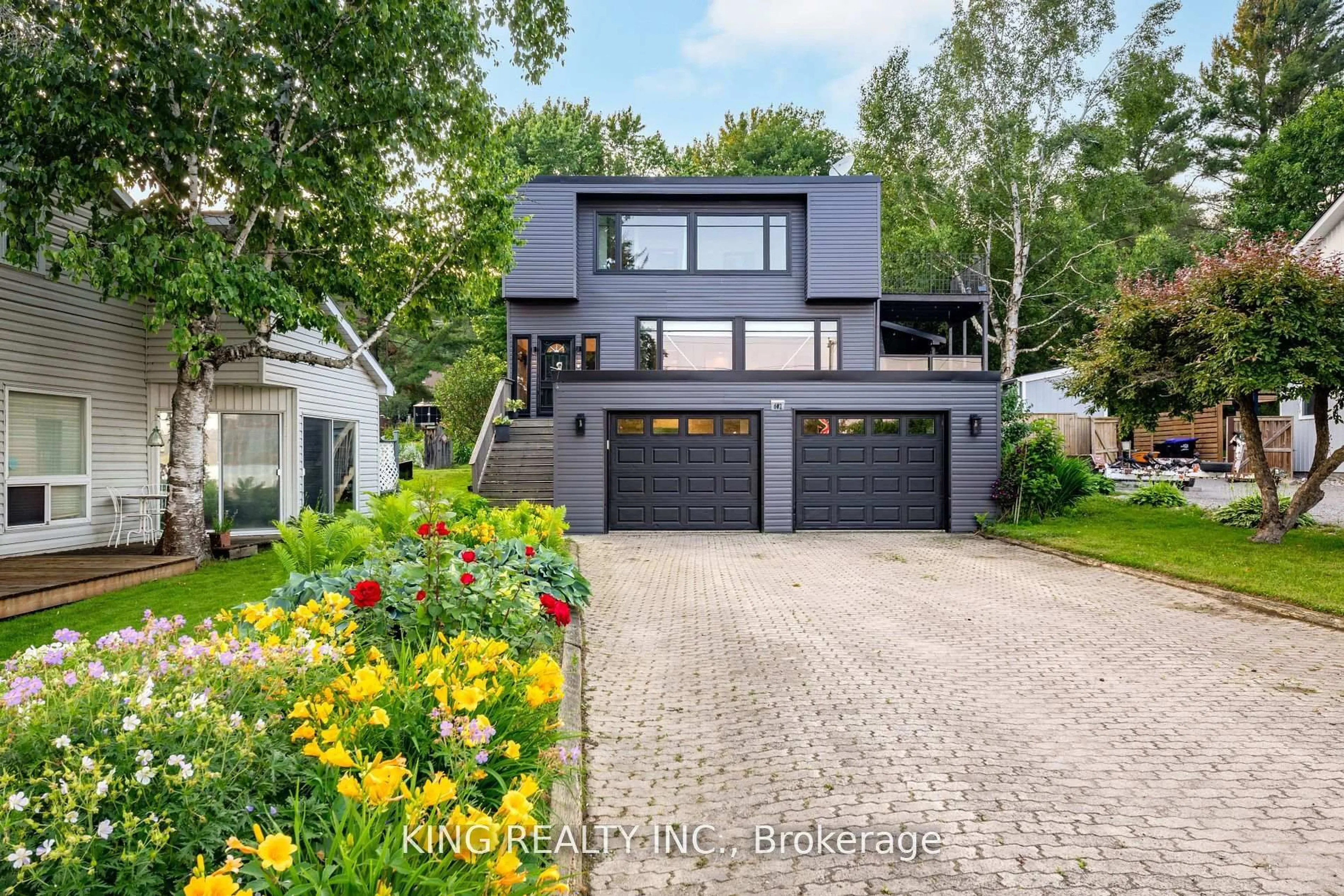 Home with brick exterior material, street for 602 CHAMPLAIN Rd, Tiny Ontario L9M 0C2