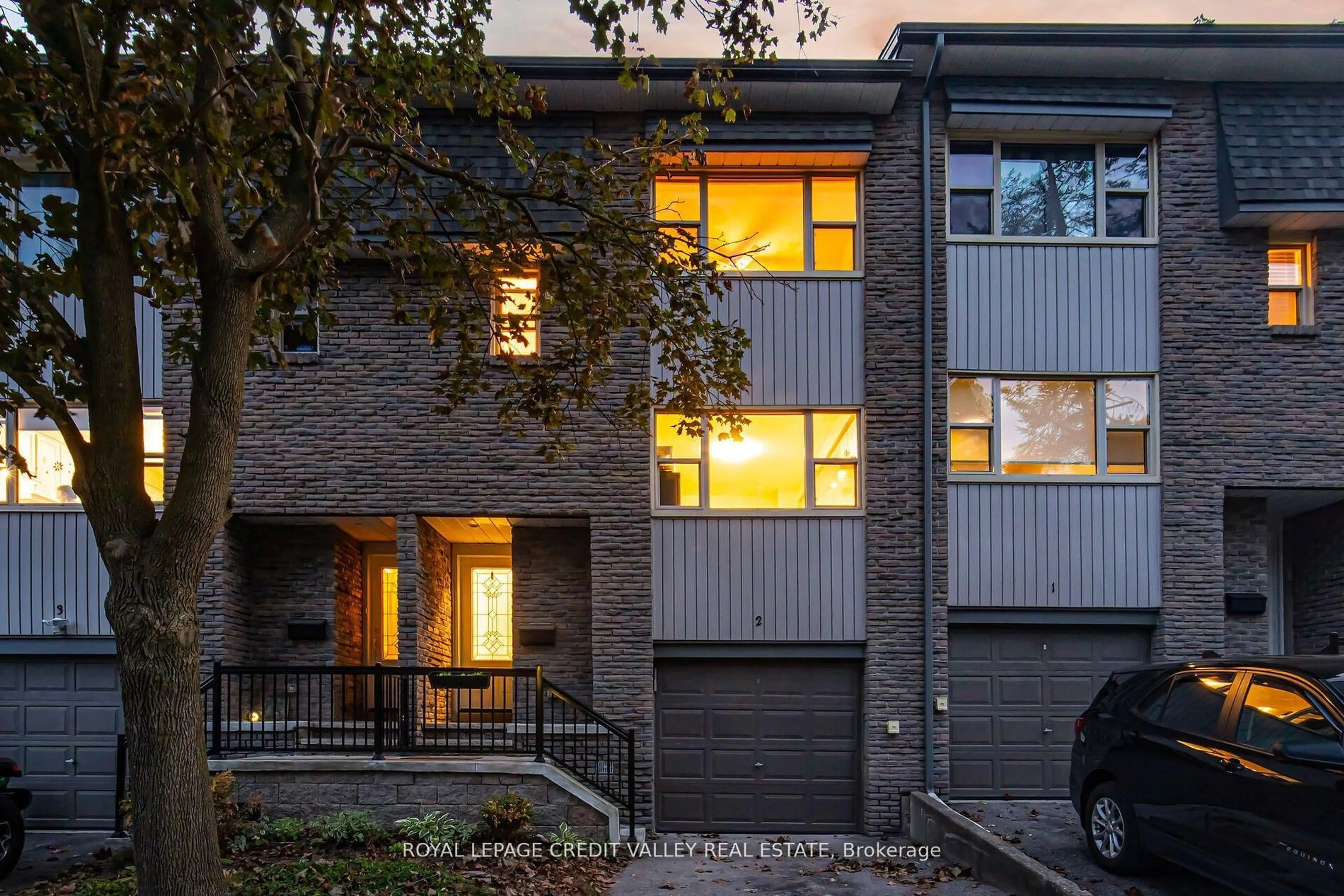 Home with brick exterior material, street for 2 North St #2, Barrie Ontario L4M 2R9