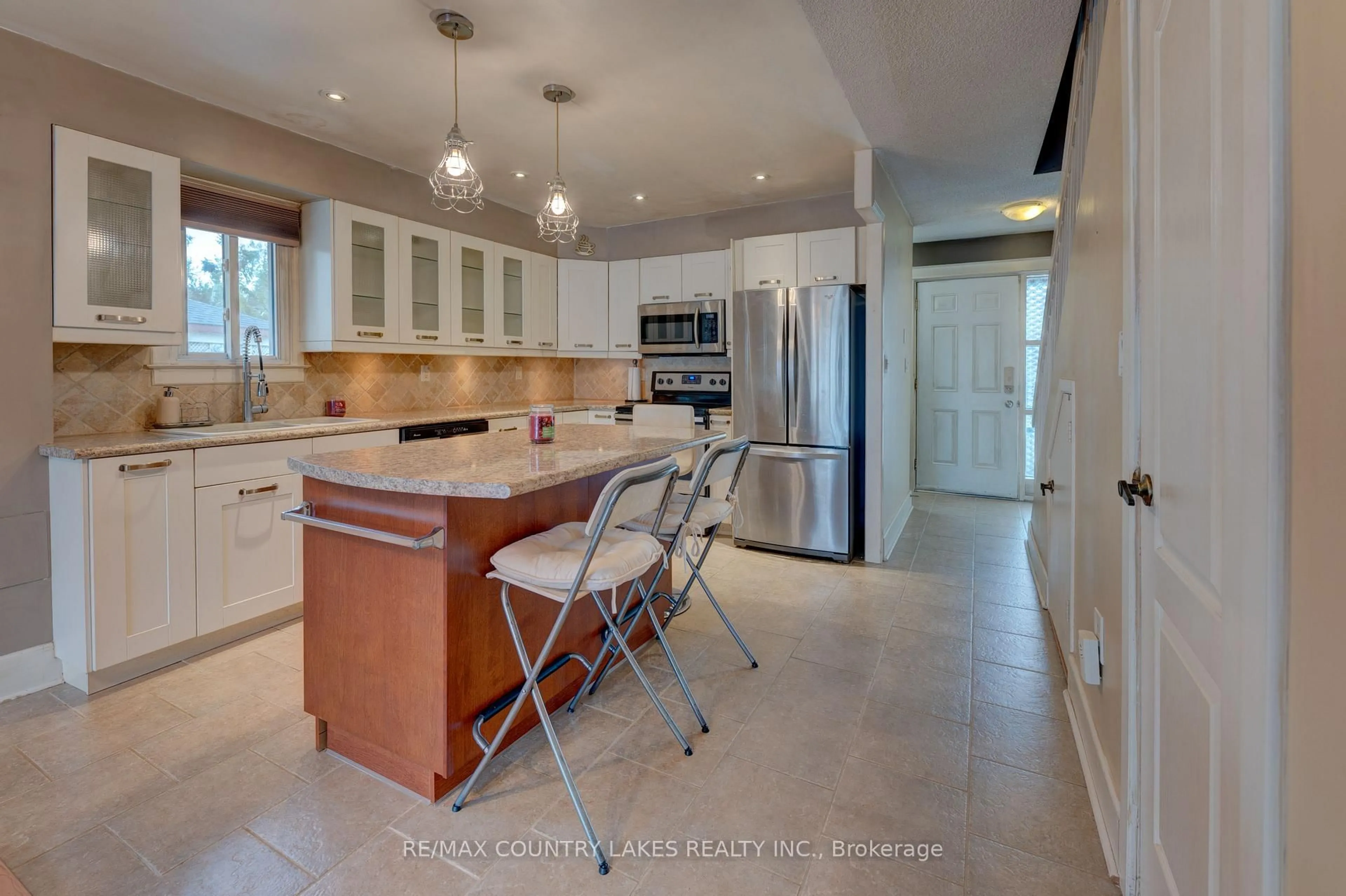 Open concept kitchen, ceramic/tile floor for 4 Paradise Blvd #1, Ramara Ontario L0K 1B0