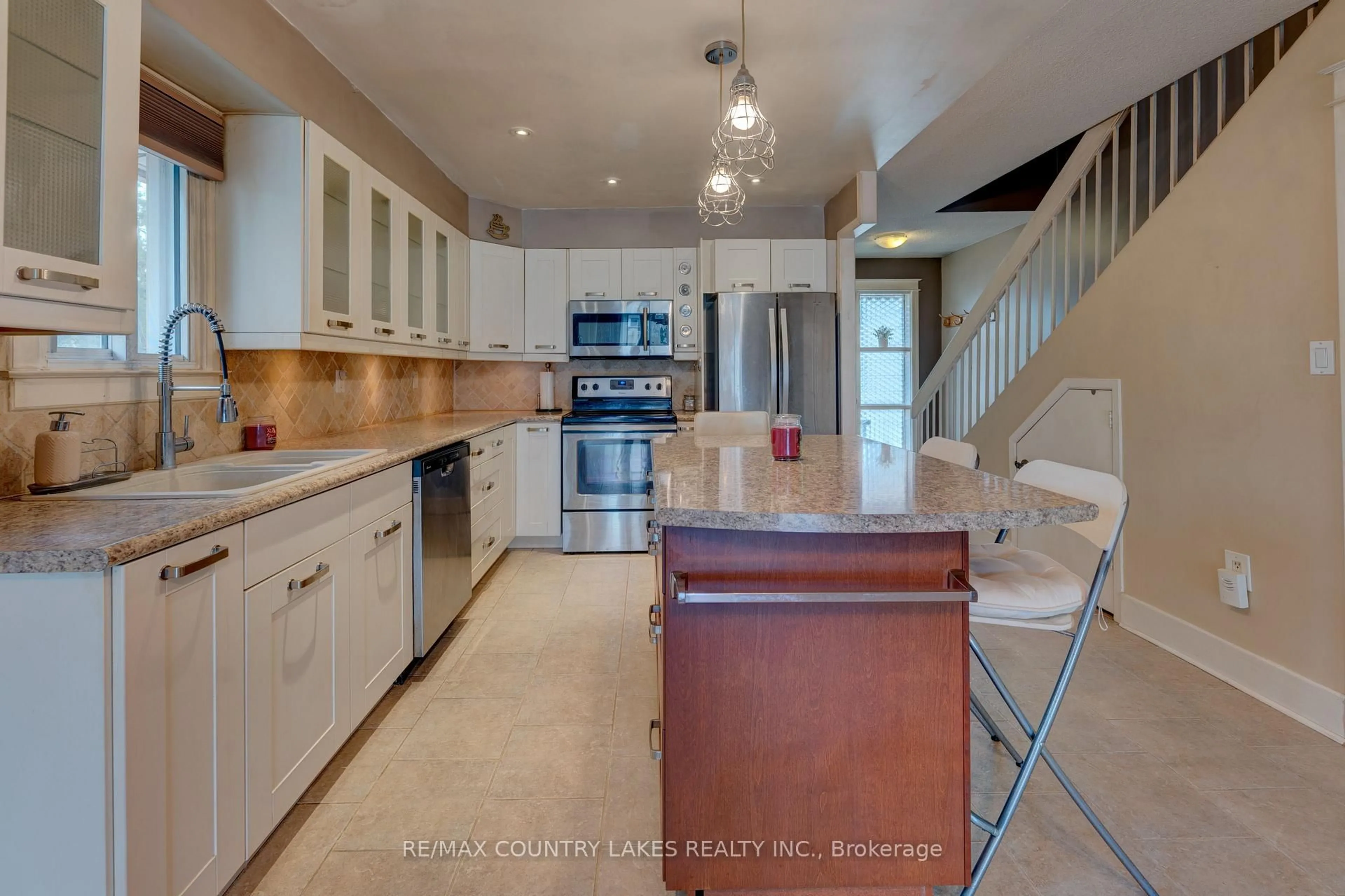 Open concept kitchen, ceramic/tile floor for 4 Paradise Blvd #1, Ramara Ontario L0K 1B0