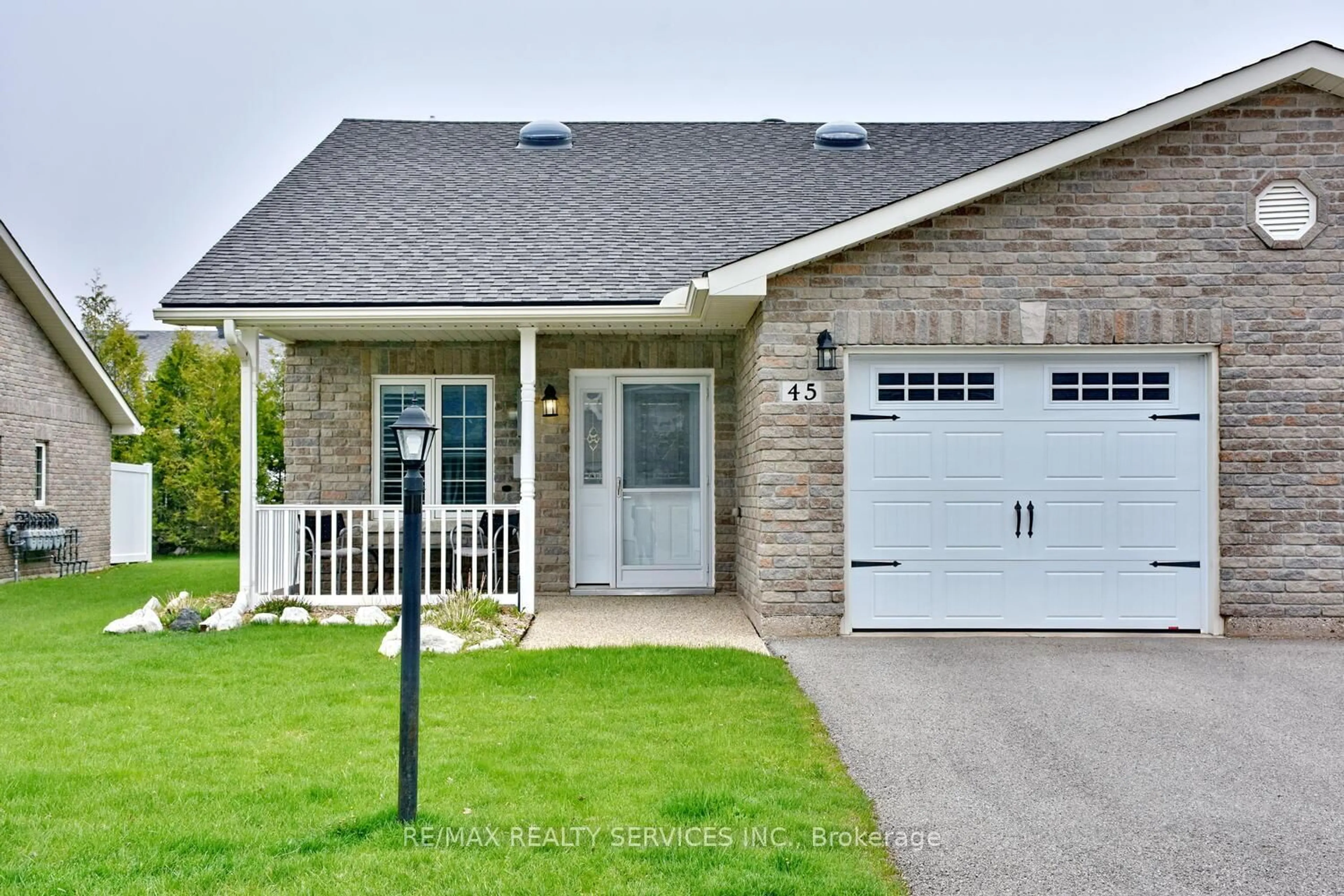 Home with brick exterior material, street for 45 Clover Cres, Wasaga Beach Ontario L9Z 0G4